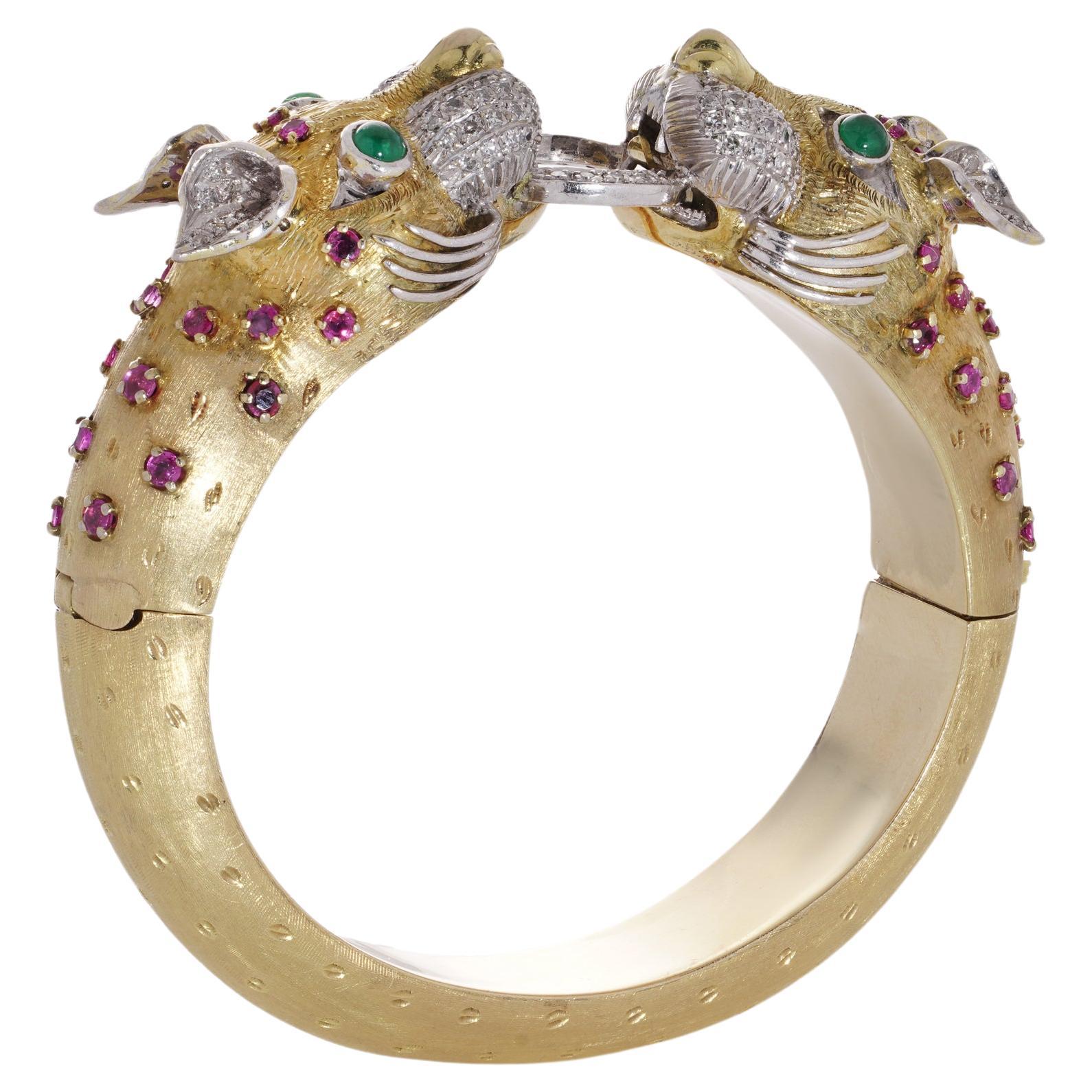 Larry 14kt. gold bangle with two dragon heads with diamonds, emeralds and rubies For Sale