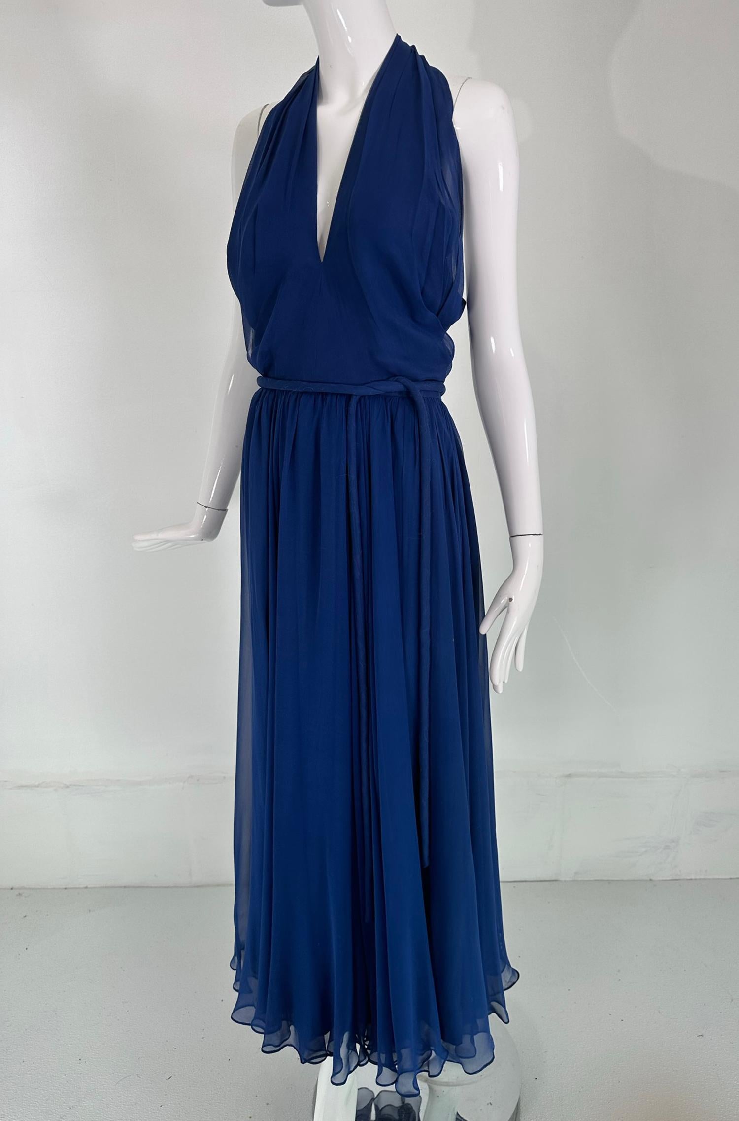 Larry Aldrich, Bonwit Teller, royal blue silk chiffon plunge V halter neck maxi dress from the 1970s. Classic 1940s  Hollywood goddess style gown in a beautiful shade of royal blue. The dress is lined, the chiffon is sheer. The halter top is fitted