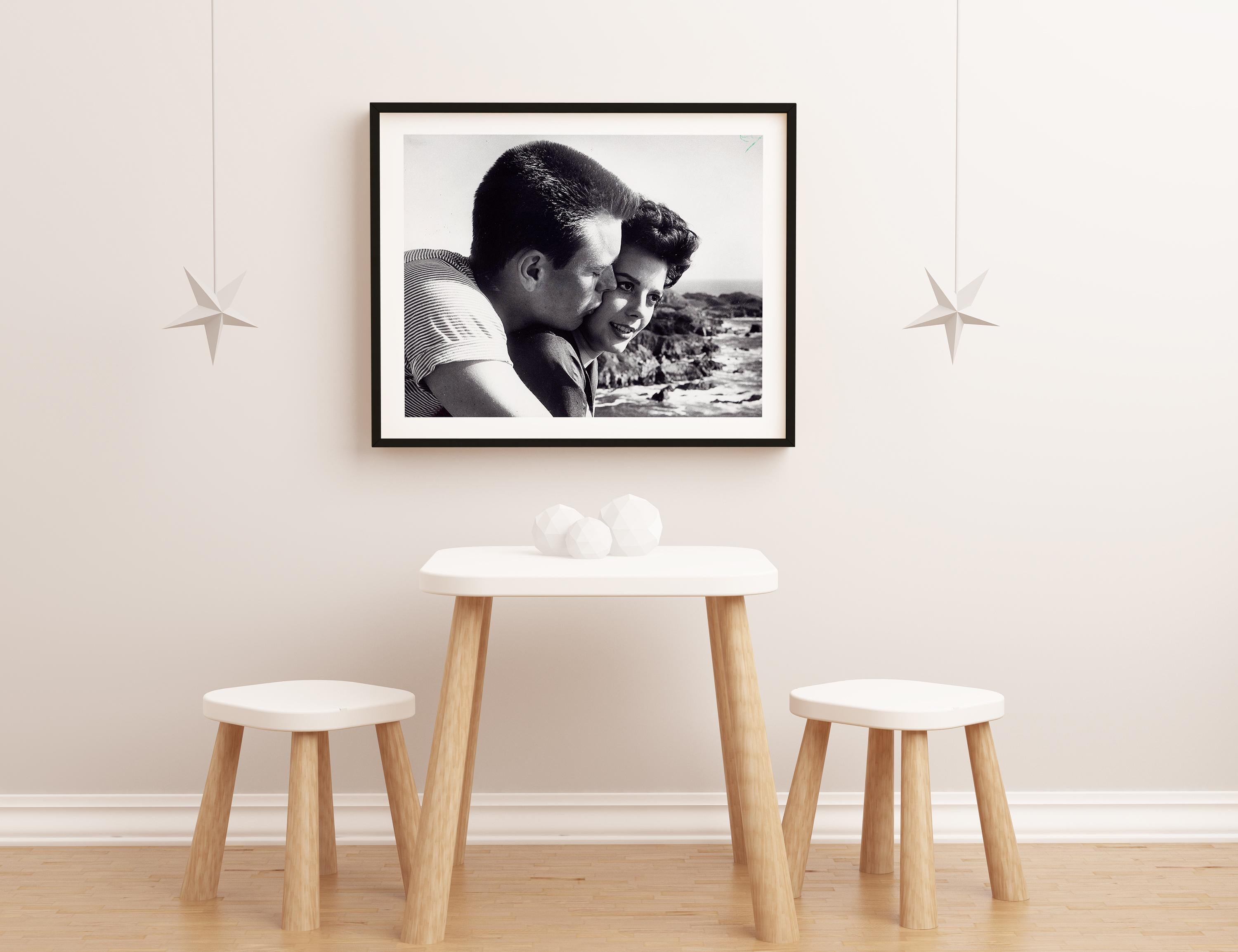 Robert Wagner Kissing Natalie Wood Fine Art Print - Black Black and White Photograph by Larry Barbier