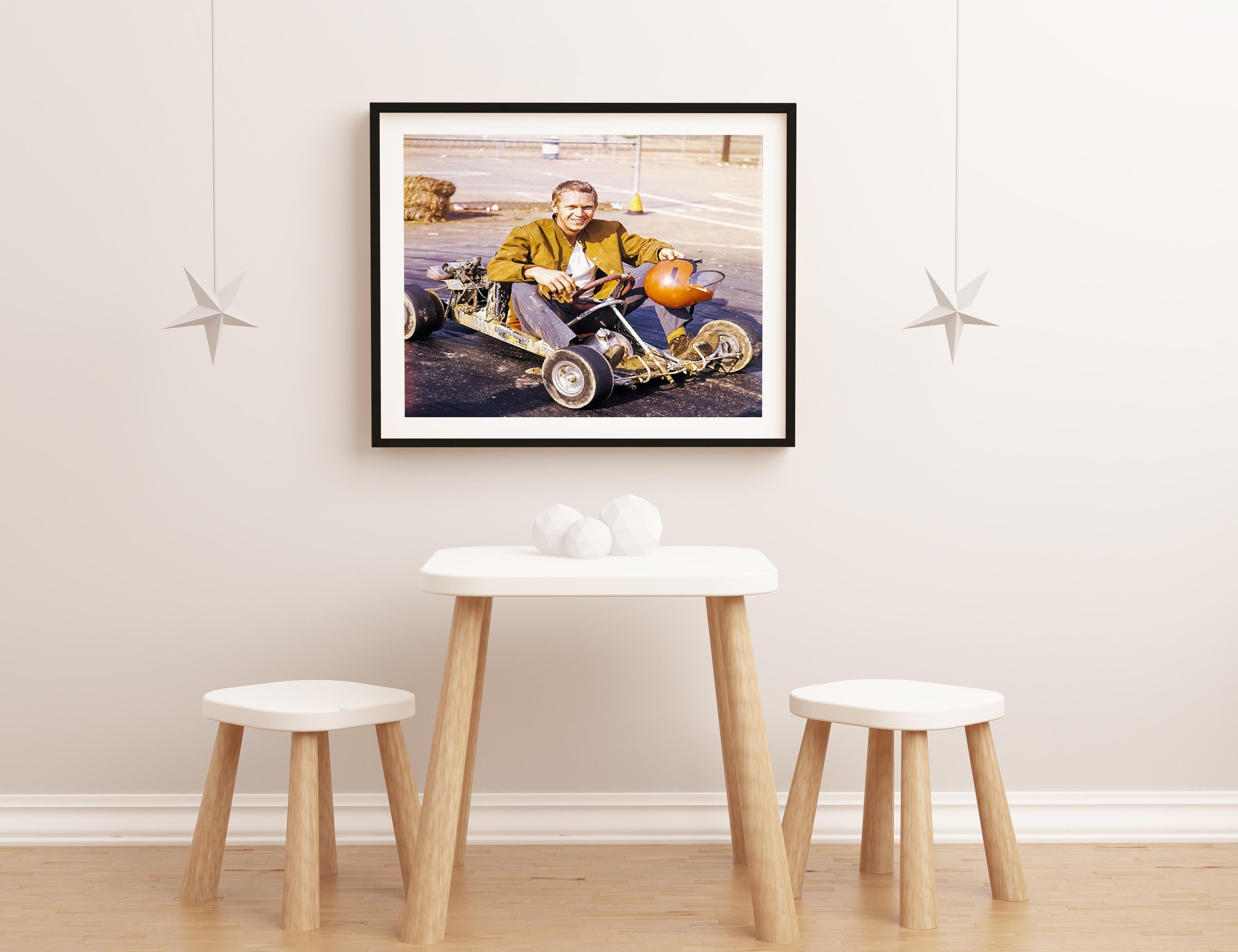 Steve McQueen in His Go-Kart Fine Art Print - Beige Portrait Photograph by Larry Barbier