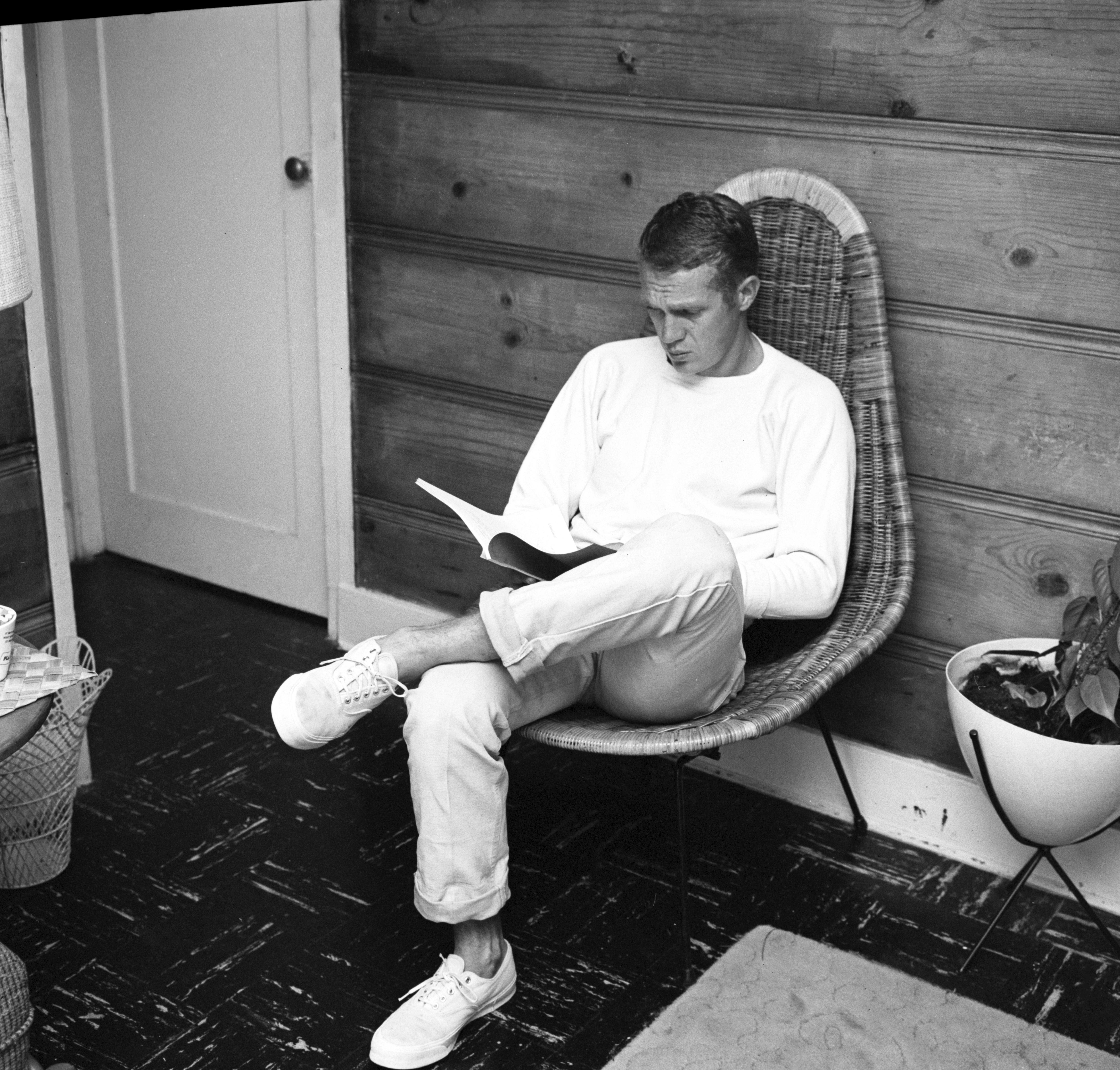 Larry Barbier Portrait Photograph - Steve McQueen Reading at Home Fine Art Print