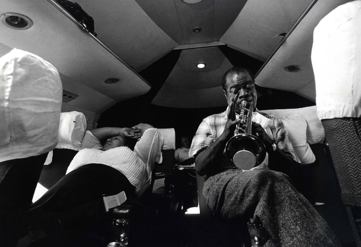 Larry Burrows Black and White Photograph - Why Do I Love You? Louis Armstrong at 14, 000 feet over Africa, May 1956