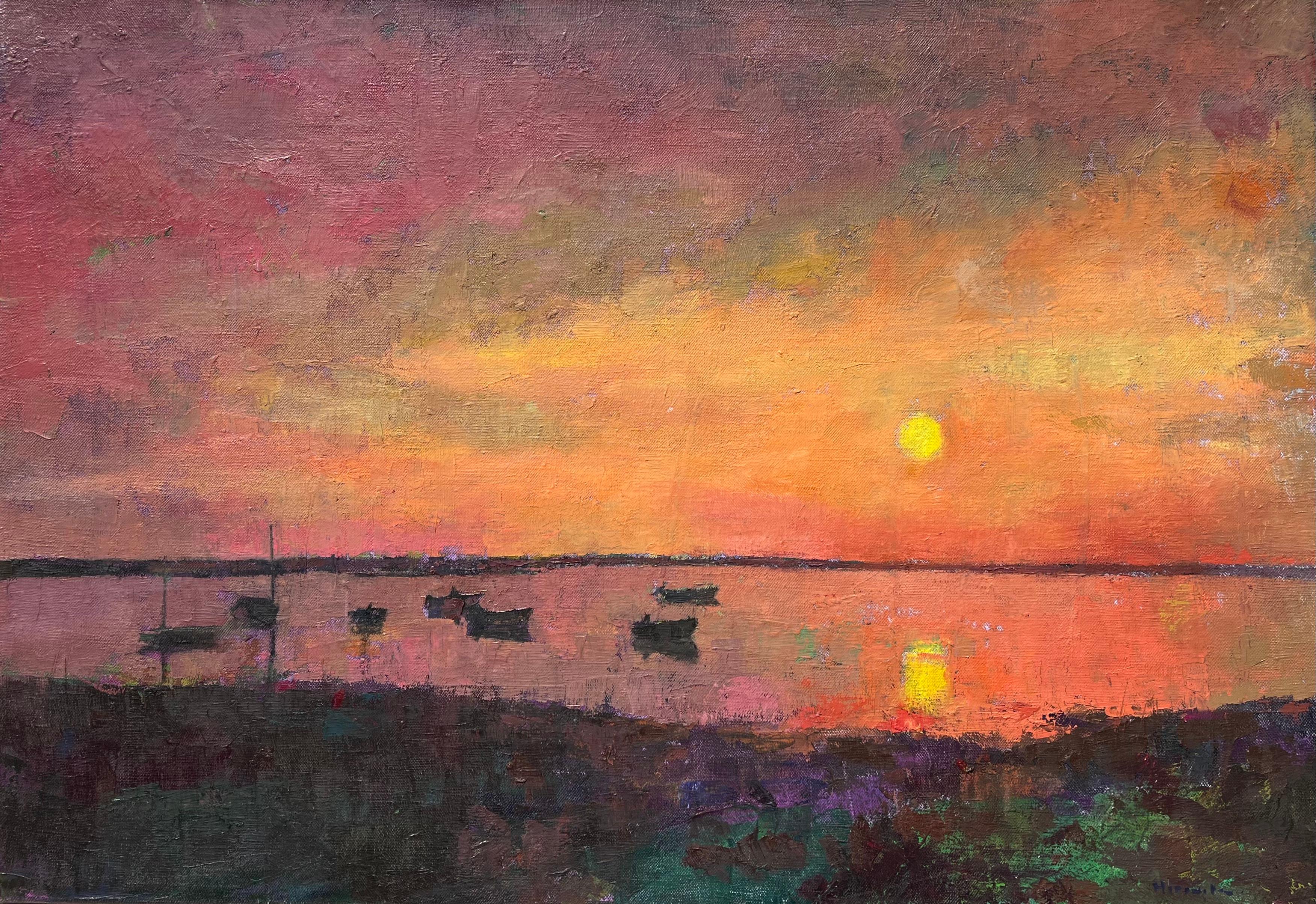 "Sunrise" the water reflects a purple sky awakened by the sun, boats at bay