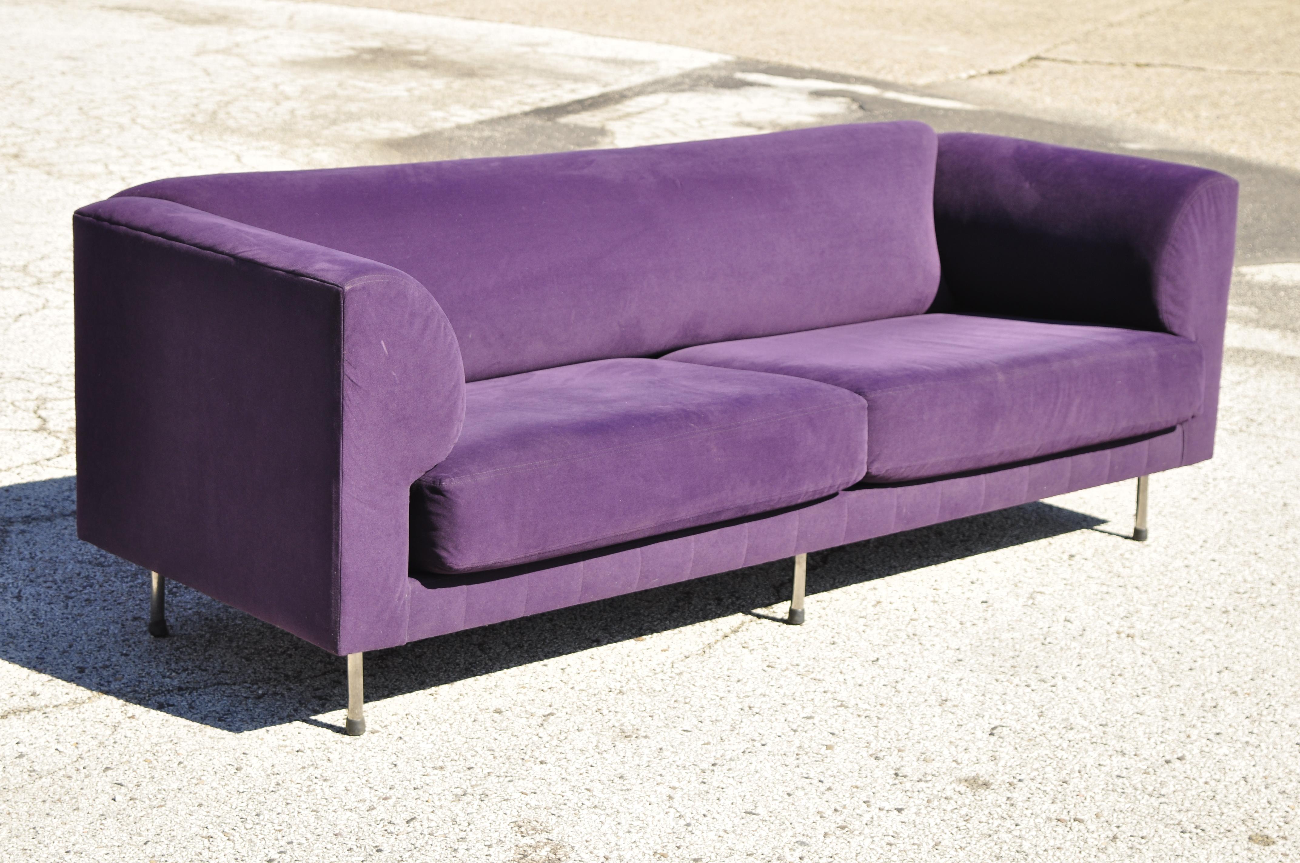 Larry Laslo for Directional purple modern Italian Bauhaus style chrome leg sofa. Listing includes 6 chrome metal legs, purple microfiber upholstery, original label, clean modernist lines, sleek sculptural form, circa late 20th century. Measurements: