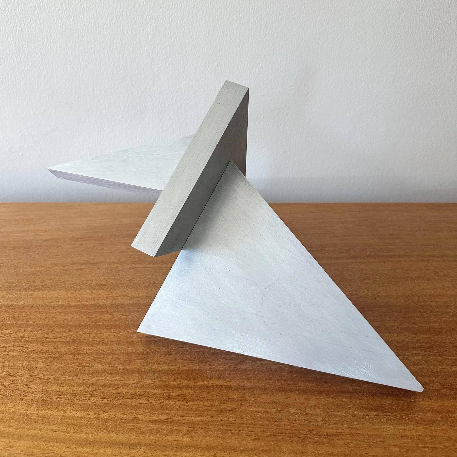 An aluminum sculpture by Larry Mohr. Acquired from the Mohr's estate. Can be arranged in different positions. Minor nicks to the edges see photos. Untitled and unsigned.