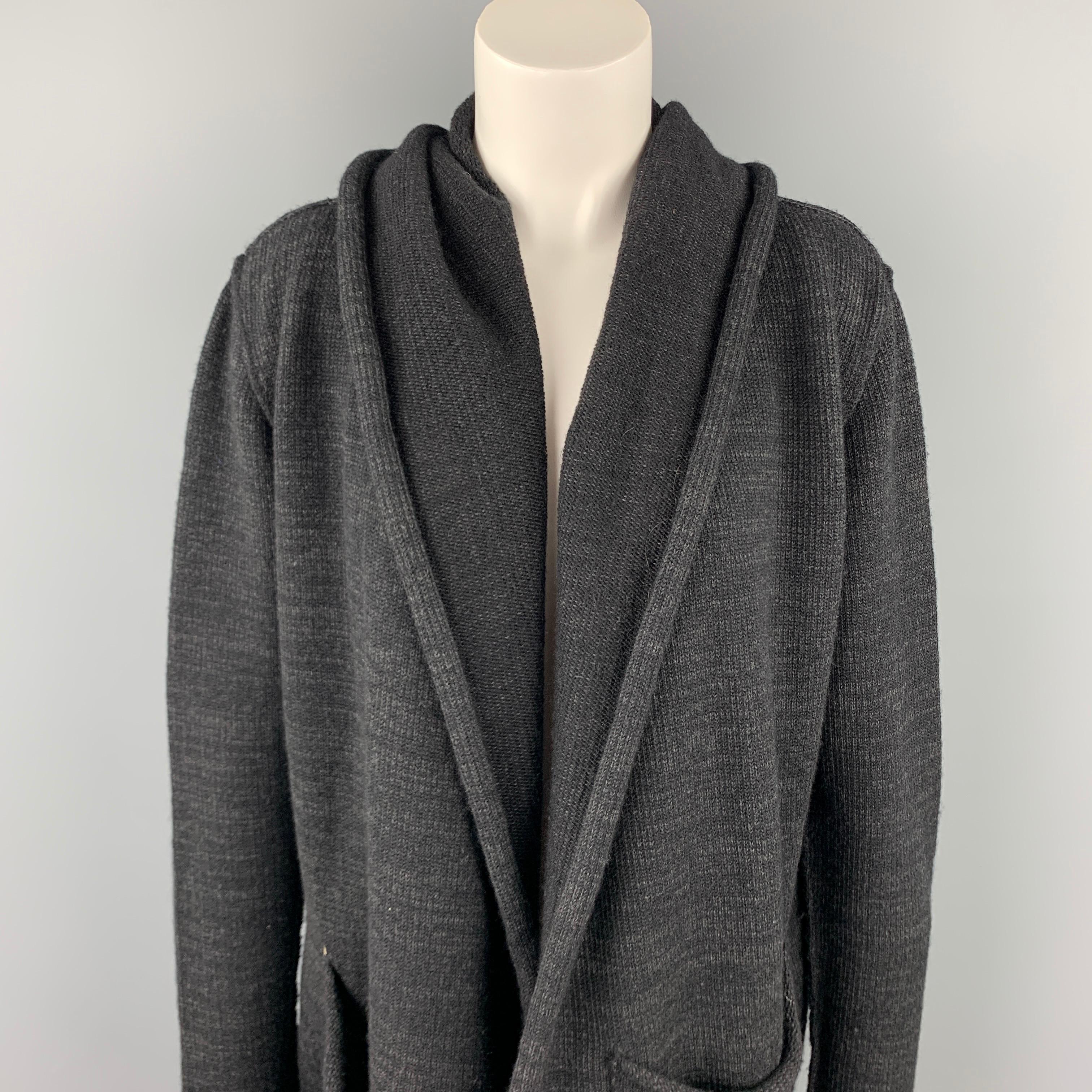 LARS ANDERSON cardigan comes in a charcoal knitted material featuring a hooded style, front pockets, and a open front. Made in USA.

Very Good Pre-Owned Condition.
Marked: 8

Measurements:

Shoulder: 17 in.
Bust: 42 in. 
Sleeve: 29 in.
Length: 27