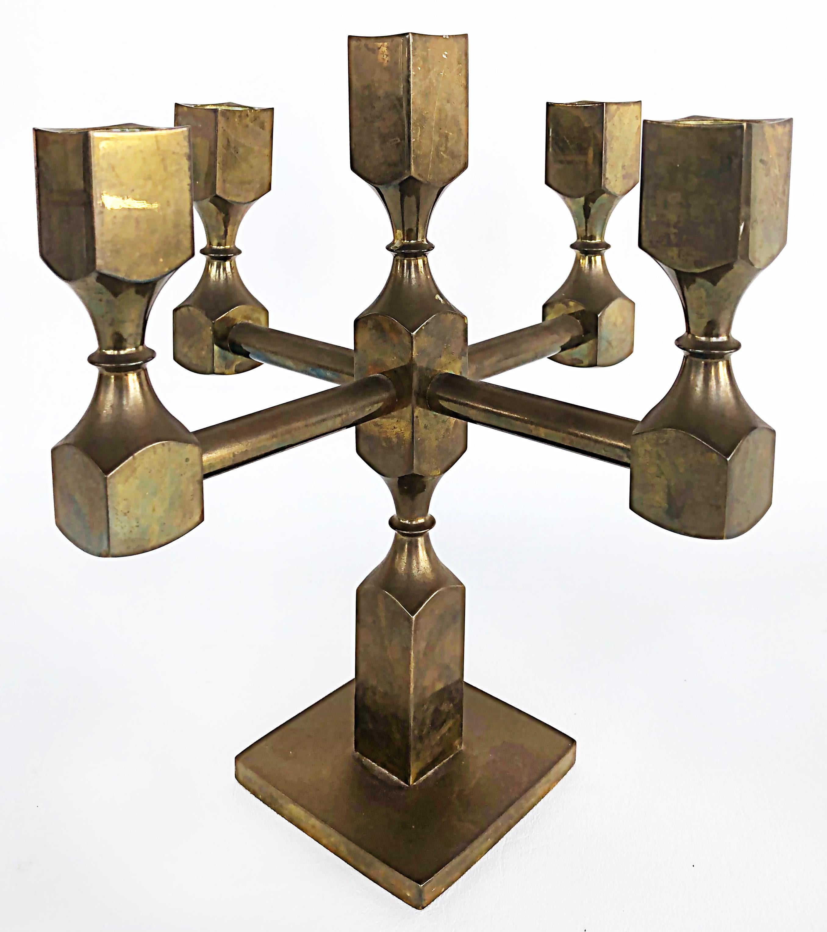 Lars Bergsten for Gusum Metallslöjden, Sweden Signed Brass Candelabras, 1985

Offered for sale is pair of brass candelabra designed by Lars Bergsten for Gusum Metallslöjden, Sweden signed and dated 1985. The candelabras accept 5 candles and are