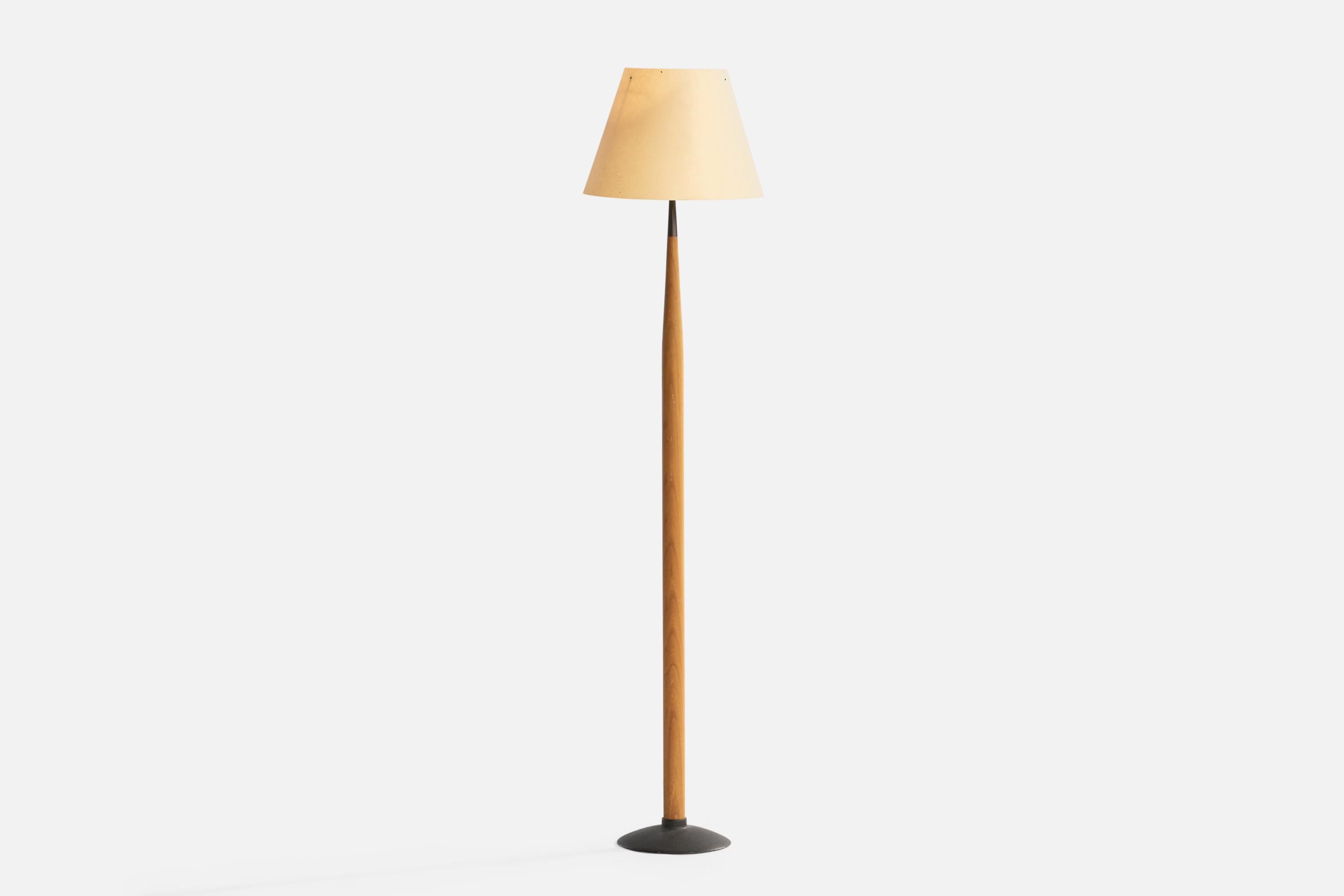 An oak, black-lacquered metal and paper floor lamp designed and produced by Lars Bessfelt, Anderslöf, Sweden, 1980s.

Overall Dimensions (inches): 52” H x 12” Diameter. Stated dimensions include shade.
Bulb Specifications: E-26 Bulb
Number of