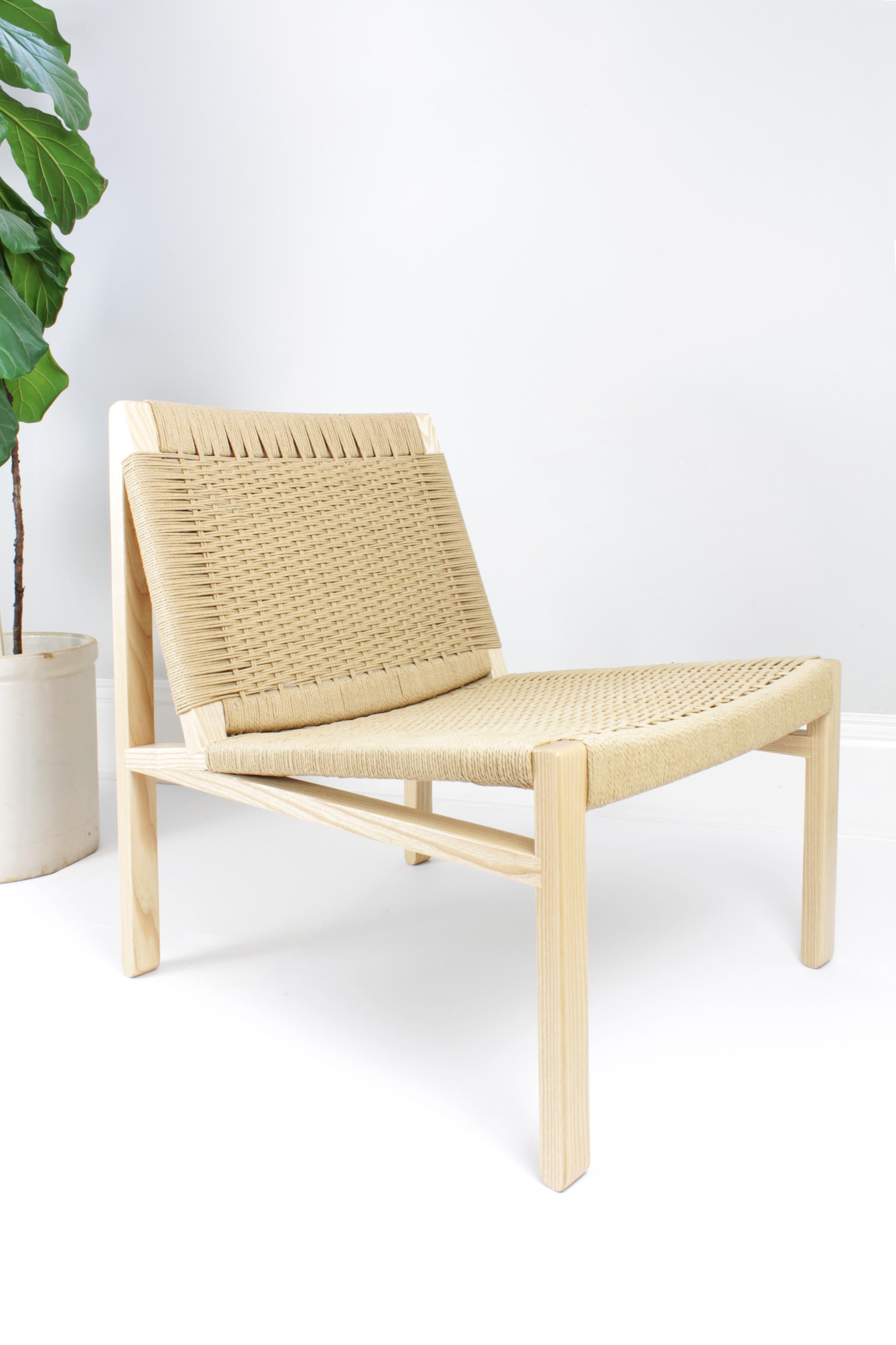 A Classic style re-imagined. The Lars lounge chair features a solid wood frame with your choice of Danish cord or woven leather straps for the seat and back.