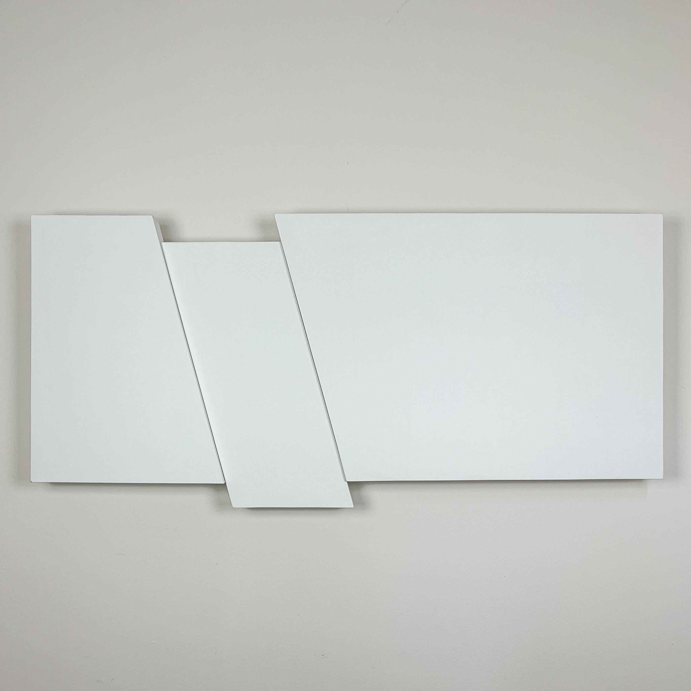 An original Minimalist artwork / wall relief, “Relief in white no. 63”. Sculpted by Swedish artist Lars-Erik Falk in 1981. 

The relief consists of three separate parts. The middle section staggers on both the horizontal and vertical planes and is