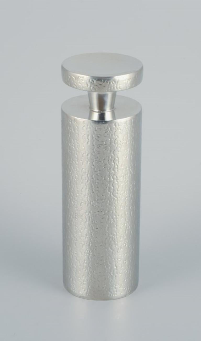 Lars Göransson, hammered modernist pewter cocktail shaker.
High-quality cocktail shaker.
1978.
In perfect condition.
Marked.
Dimensions: H 21.5 x 7.0 cm.