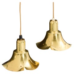 LARS HOLMSTRÖM A pair of brass ceiling lamps stamped Sweden 1960s LARS HOLMSTRÖM A pair of brass ceiling lamps stamped Sweden 1960s