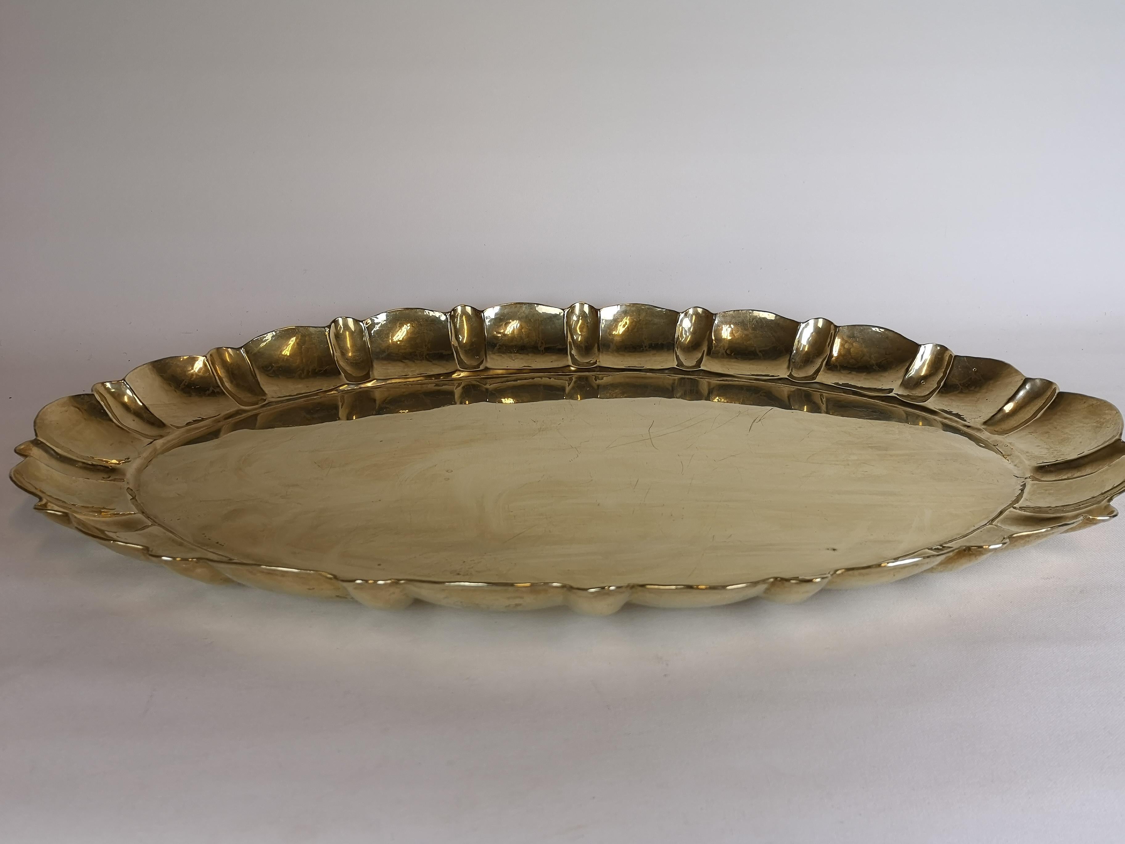 This handcrafted tray made in solid brass was made in Arvika Sweden. The design by Lars Holmström.

Good Condition.

Measures W 56 D 38 cm