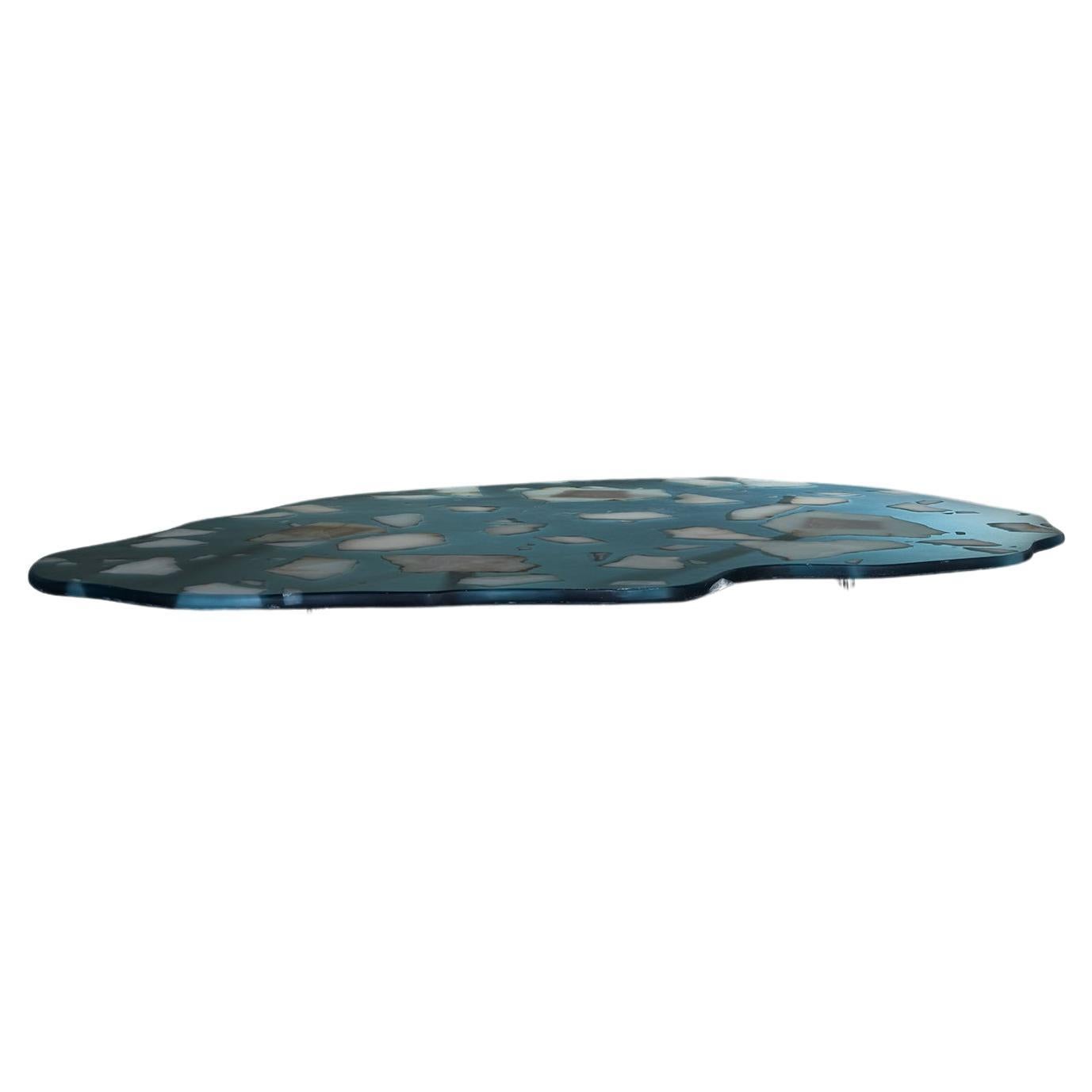 A sculptural piece that reflects the fragile beauty of our planet

The Larsen Table is far more than a functional piece of furniture-it is a poetic and powerful expression of nature's transformation. Crafted from cast resin and hand-split alabaster