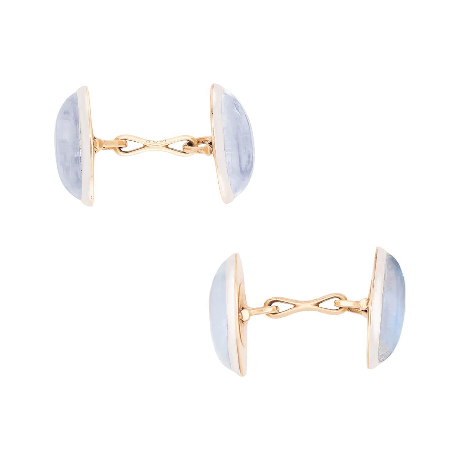 A wonderful and attractive pair of Larter & Sons cufflinks from the Edwardian (ca1900) era! These double-sided cufflinks have oval-shaped faces that display beautiful blue moonstone cabochons. Each moonstone is bezel set in 14k gold topped in