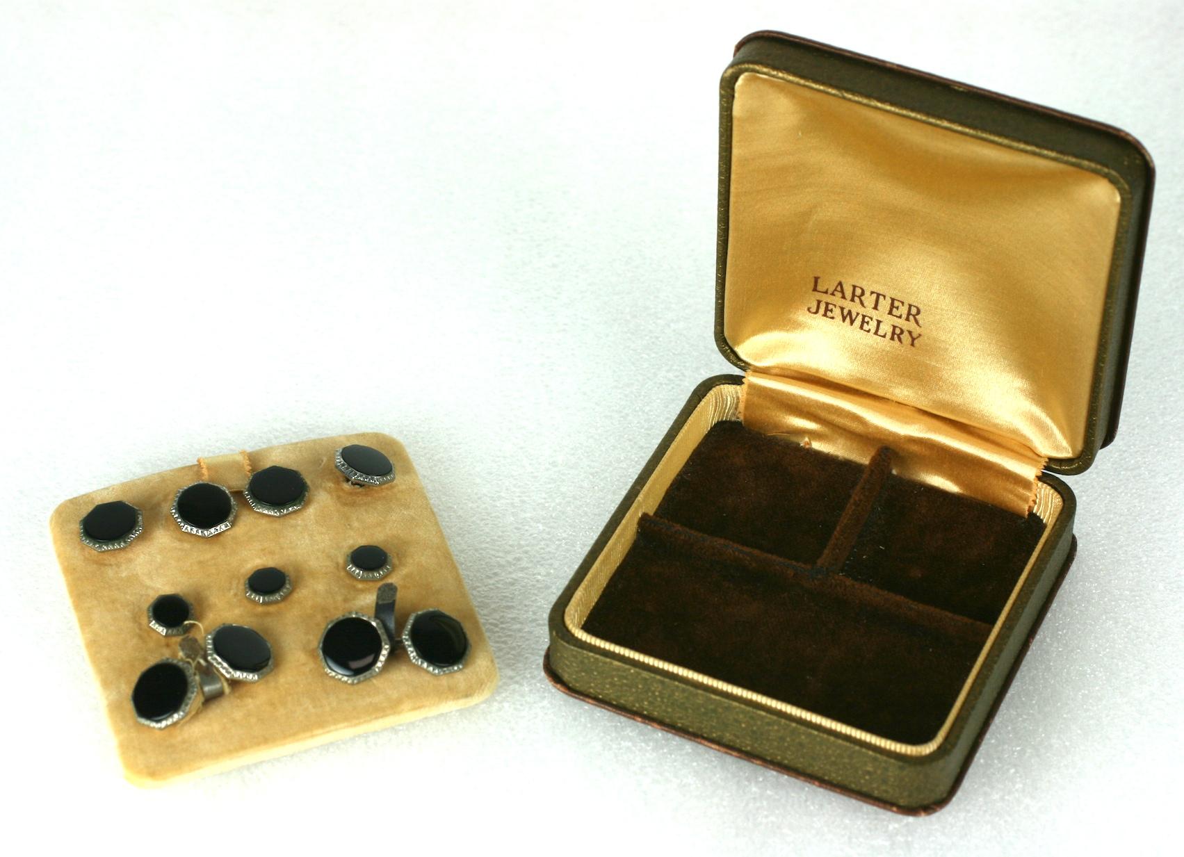 Larter Art Deco Stud Set in original box.  Set in gilded metal with ribbed hexagonal white metal settings for the onyx pieces. Set includes 3 shirt studs, 4 vest studs and a pair of cufflinks. 
Excellent condition. 
1930's USA. 