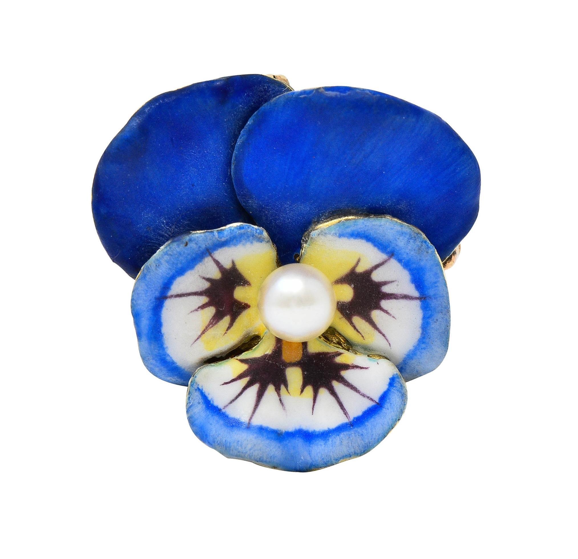 Designed as a dimensional pansy flower painted with enamel 
Opaque white, blue, yellow, and maroon with minimal loss 
Centering a 3.5 mm round pearl
White with subtle iridescence
Completed by hinged optional bale
Wit a hinged pinstem with looped