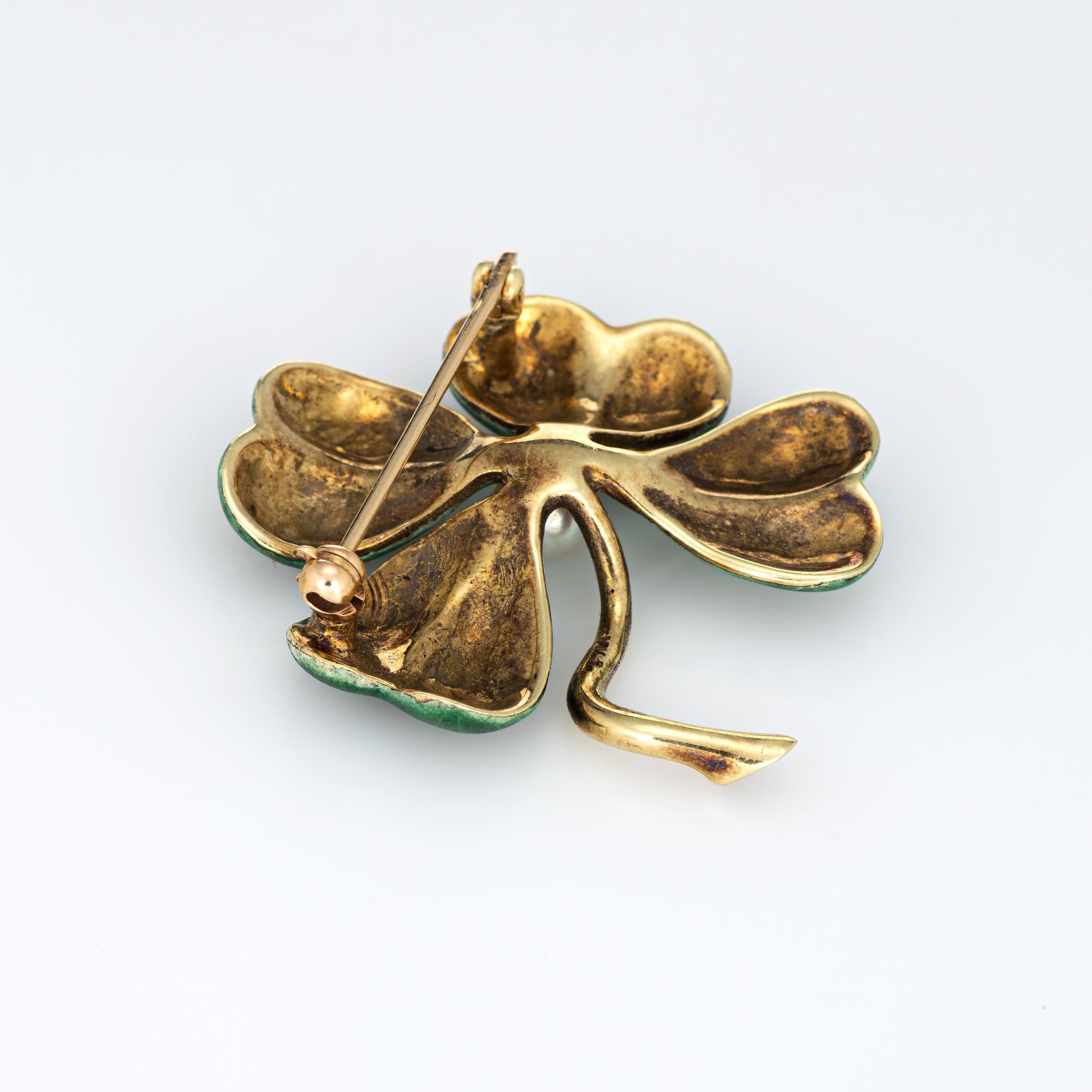 Finely detailed antique Art Nouveau Larter & Sons four leaf clover enameled brooch (circa 1910s) crafted in 14 karat yellow gold. 

One 5mm cultured pearl is set into the brooch.  

The four leaf clover brooch is enameled in dark green to lighter