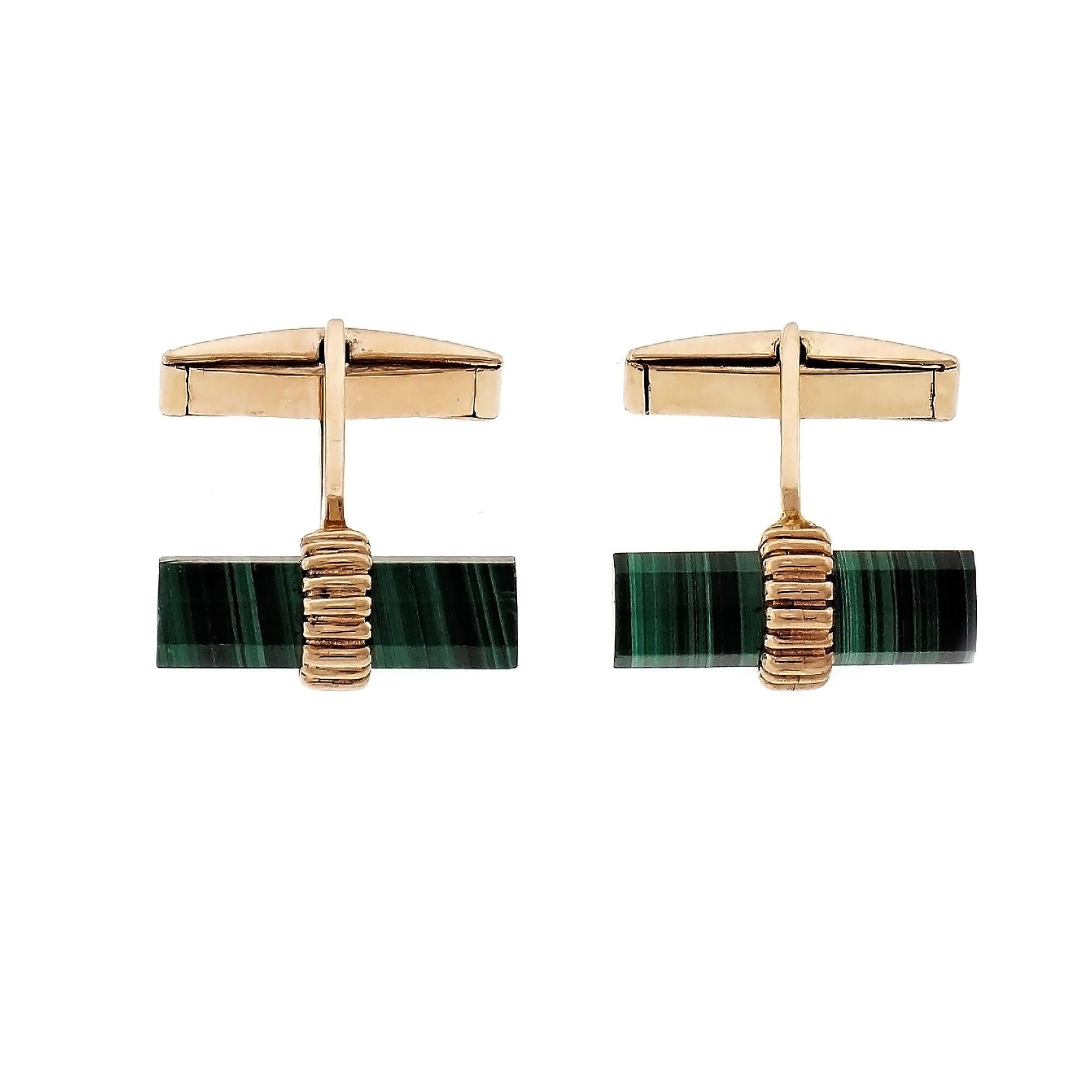 Larter & Sons natural Malachite cufflinks in 14k yellow gold. GIA certified

2 banded green Malachite bars octagonal prism, 20.2 x 6.18 x 6.07mm, GIA certificate #5192463791
14k yellow gold
Tested and stamped: 14k 
Hallmark: Larter 
8.2 grams 
Top