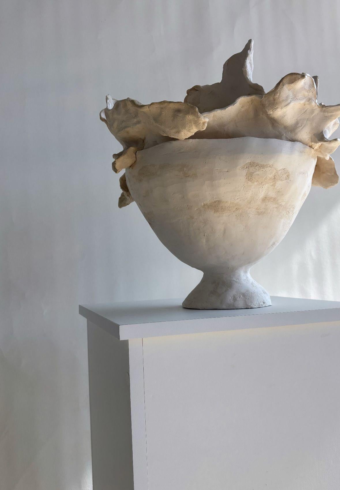 Ho scolpito un vaso grezzo che sembra essere stato scoperto in qualche scavo archeologico di epoca romana. Ho deciso di chiamarla 