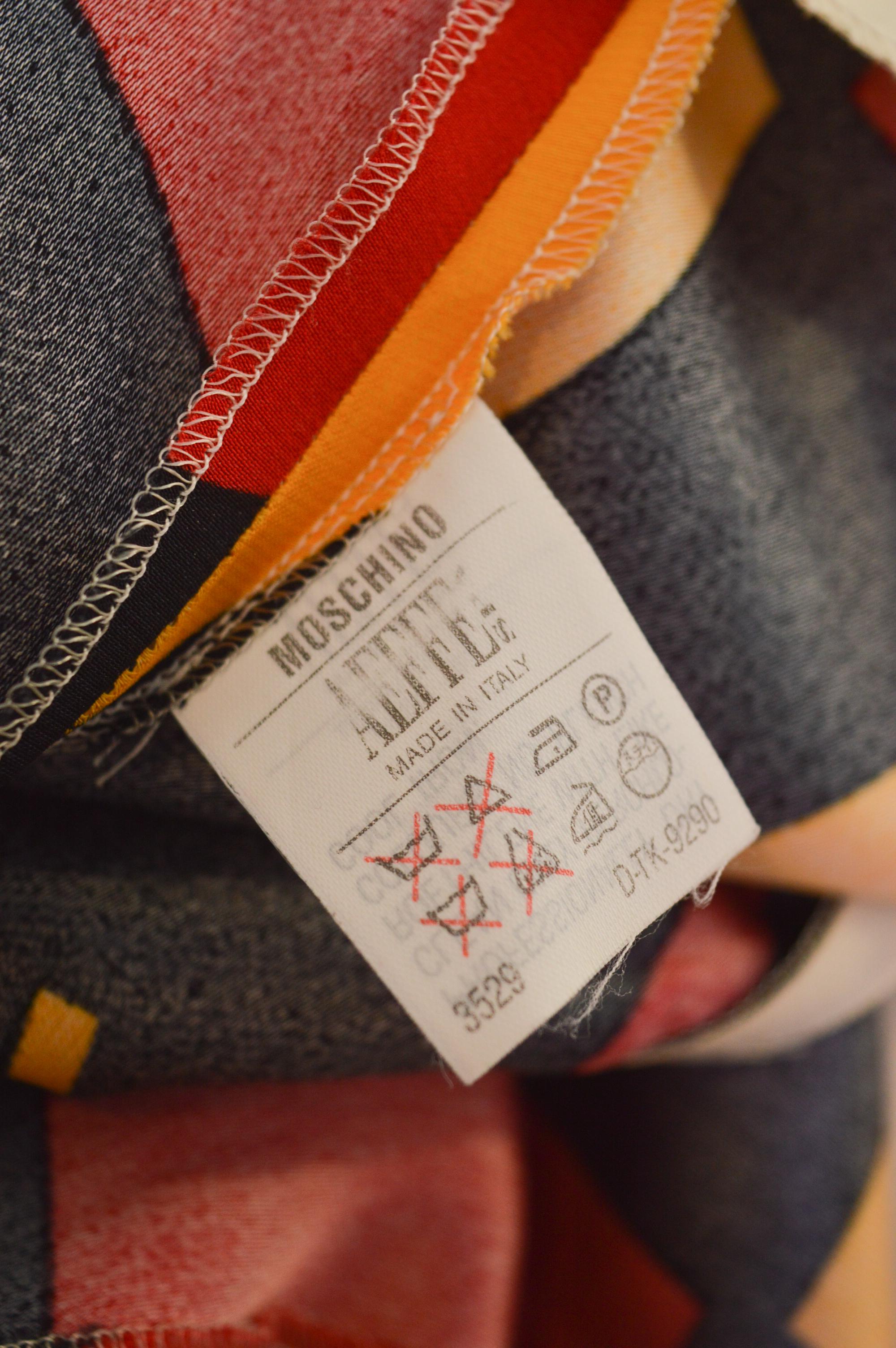 Moschino Cheap and Chic, stampa a freccette della roulette anni '90, mini abito a turni di Vega in vendita 9