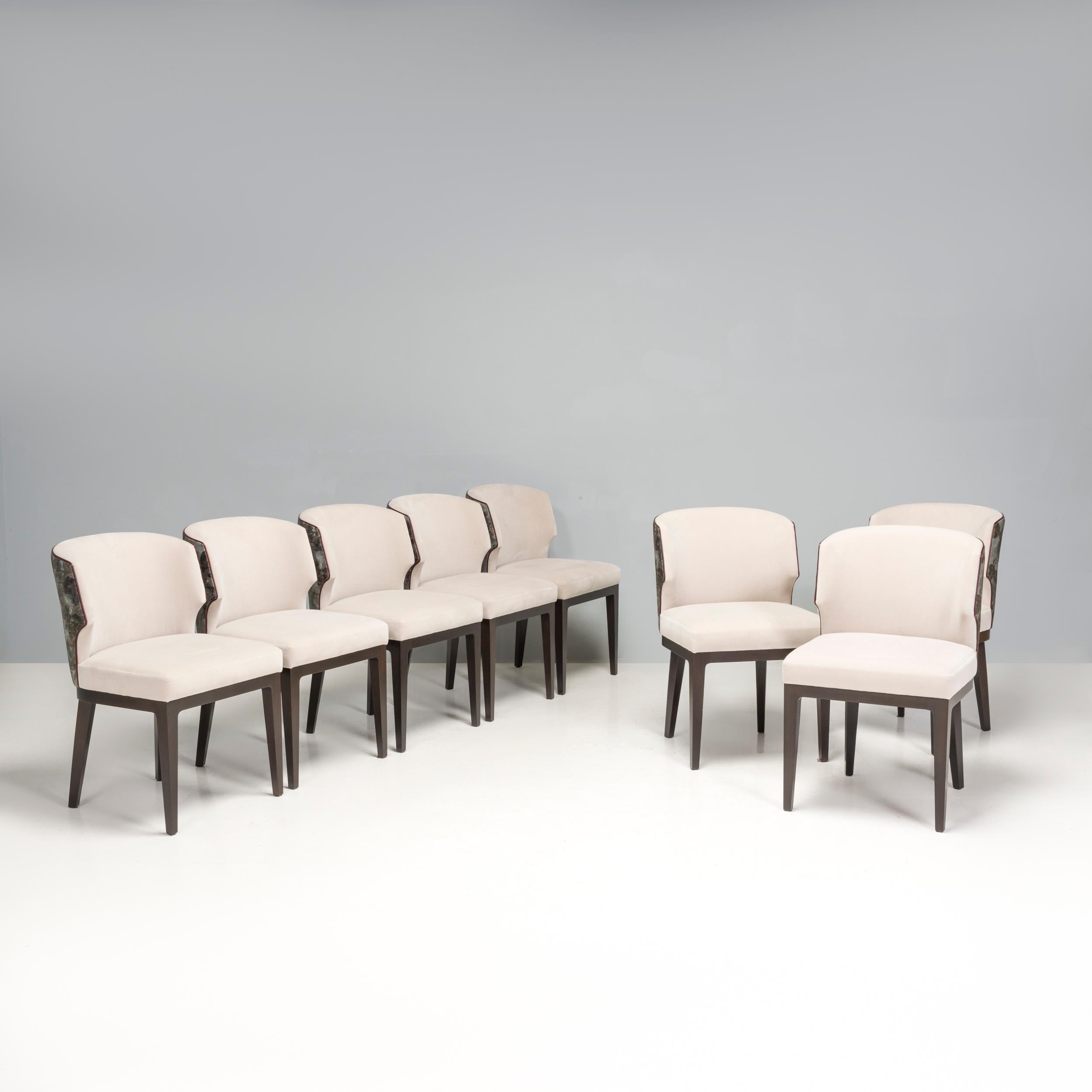 The company was founded in 1984 by Dennis Miller, an architect, who successfully brought out artist and architect-created furniture that embodied modern design ideals. 

Part of the Anees collection this set of Lasalle dining chairs is upholstered