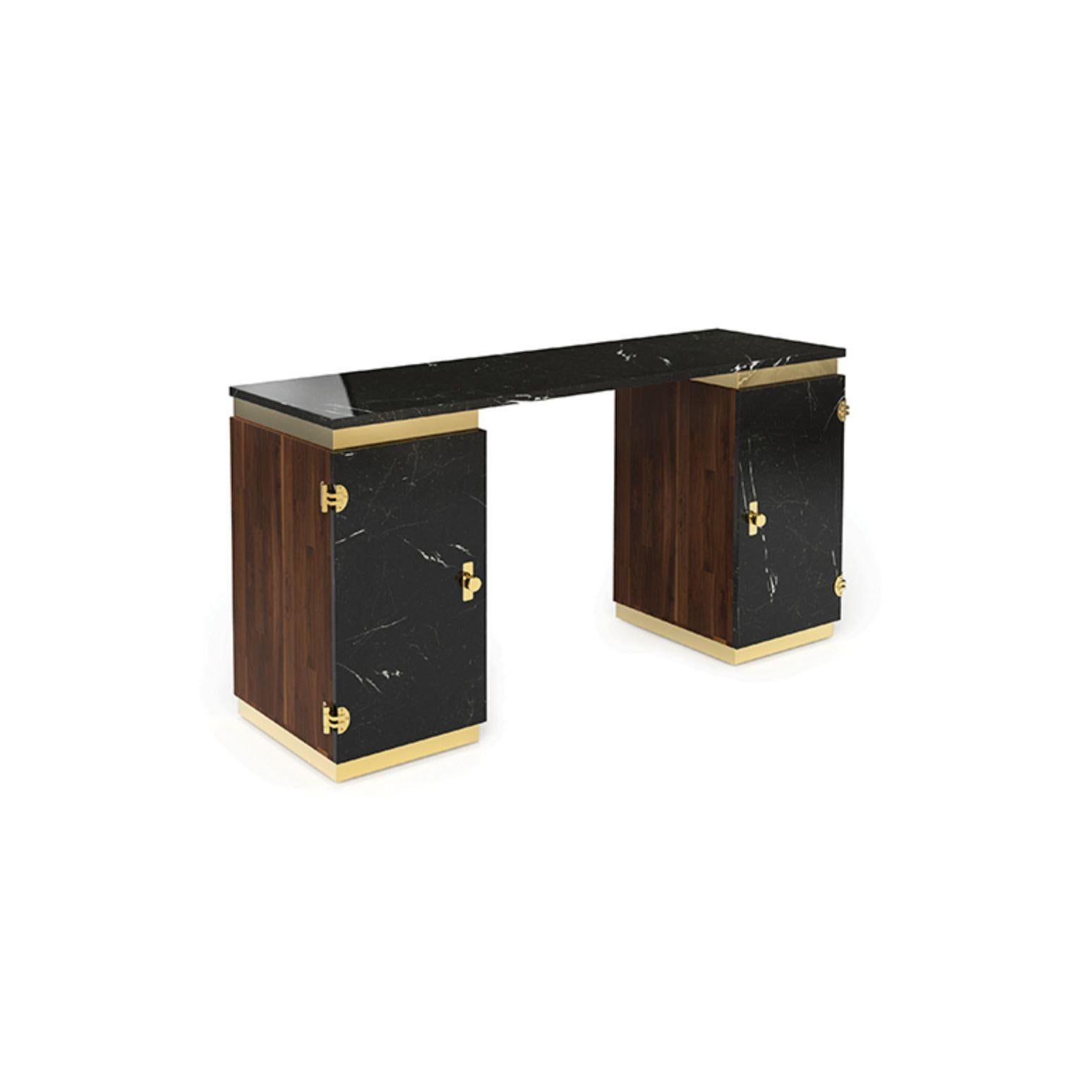 Lasdun is a writing desk inspired by the Brutalist works of Denys Lasdun. It features two cubic towers crafted from varnished walnut veneer with two doors made out of Nero Marquina marble, boasting a clean and monolithic presence. Brass details were