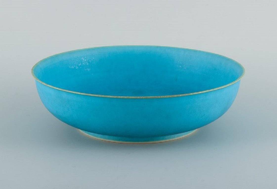 Swedish Lasse Östman for Gustavsberg, glazed stoneware bowl in turquoise. For Sale