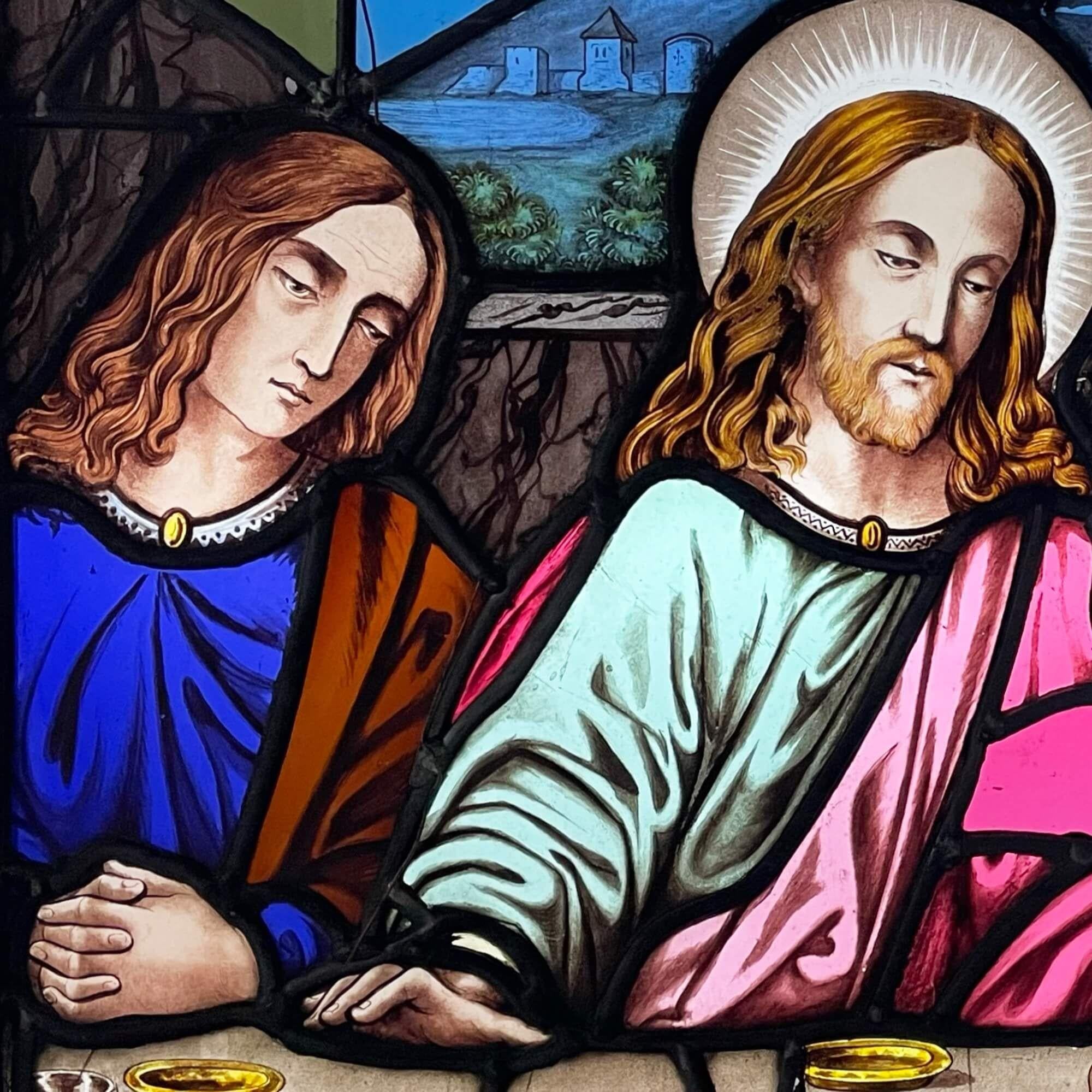 A stained glass window depicting a part of Leonardo Da Vinci’s Last Supper scene. A stunning late 19th century colourful take on the famous religious painting. This ecclesiastical style window would look beautiful with light shining through into a