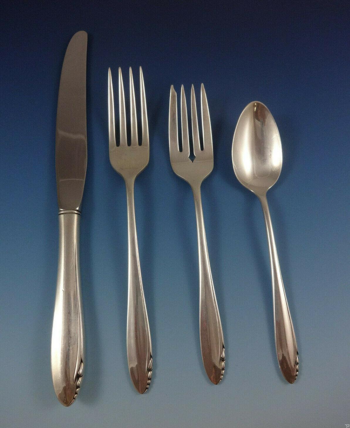Lasting Spring by Oneida sterling silver flatware set - 59 pieces. This pattern has a simple, Mid-century Modern design. This set includes:

12 knives, 8 7/8