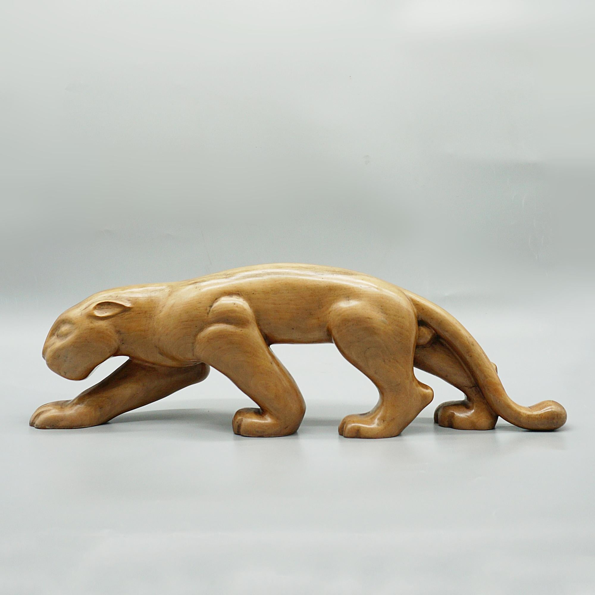An Art Deco carved fruitwood figure of a prowling panther by Laszlo Hoenig. stamped LAHO London to underside.

Dimensions: H 18cm W 57cm D 9cm

Origin: English

Date: Circa 1935

Item No: 2211241
