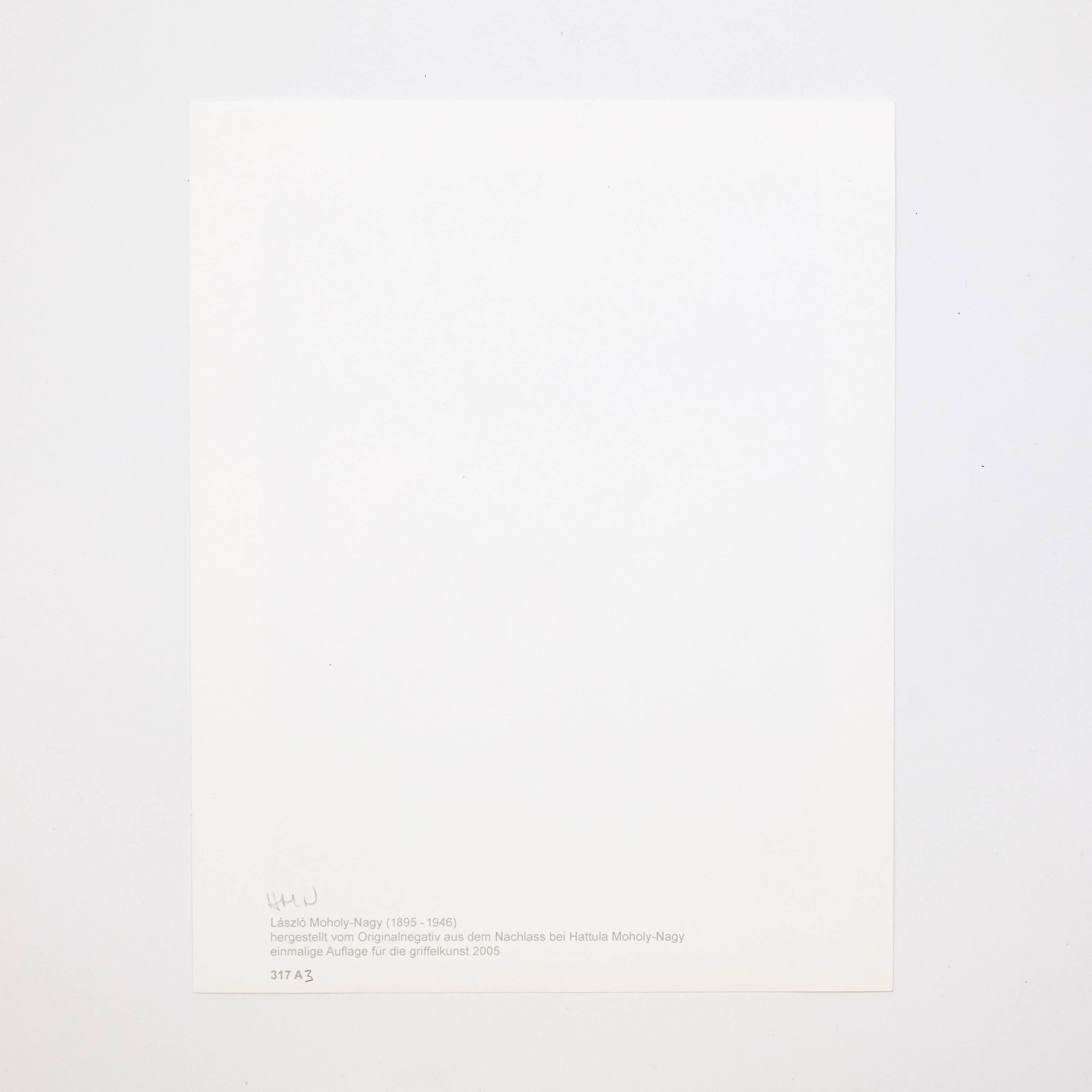 László Moholy-Nagy photography 3/6 from a set of 6 photographies.
Single edition of 'Light-Room Modulations' folder, original title 'Licht-Raum Modulationen.'
Published by Edition Griffelkunst in Hamburg, 2005.

On verso monogrammed and