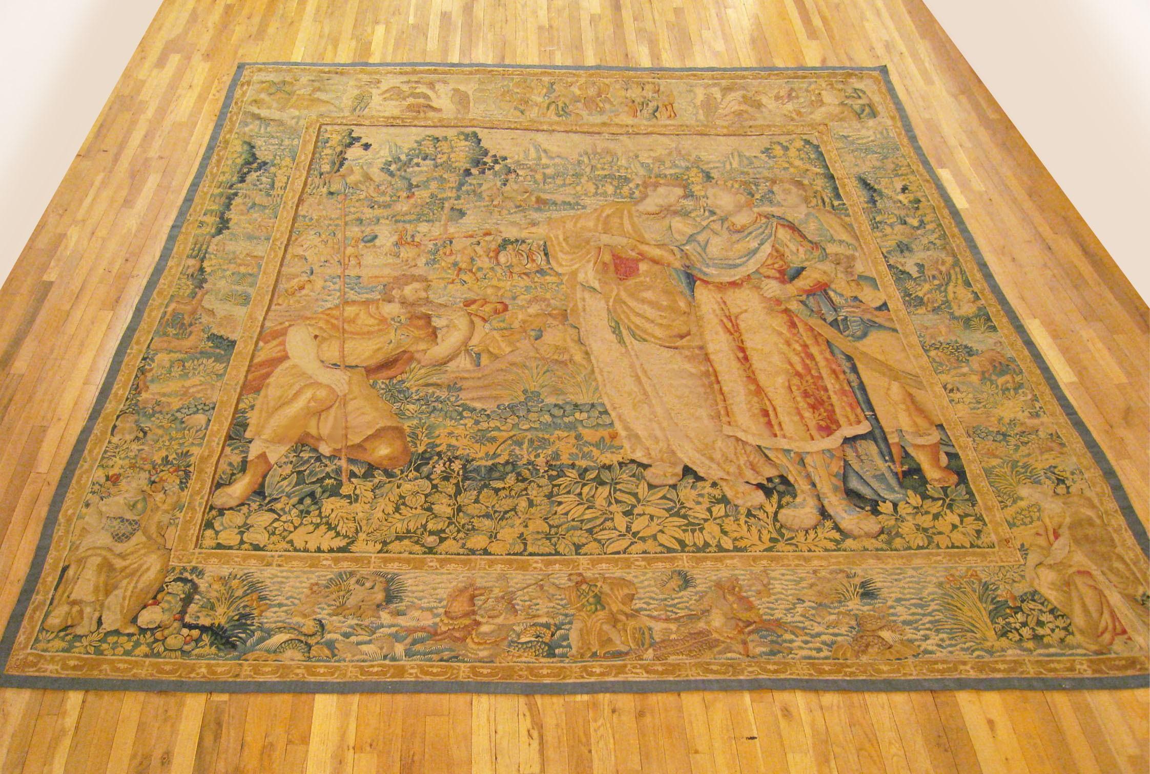 A Brussels historical tapestry, attributed to Martin Reymbouts, late 16th century. From the story of Scipio series, the renowned Roman general, a royal couple conveying honors upon Scipio, who kneels respectfully at left, expressing their