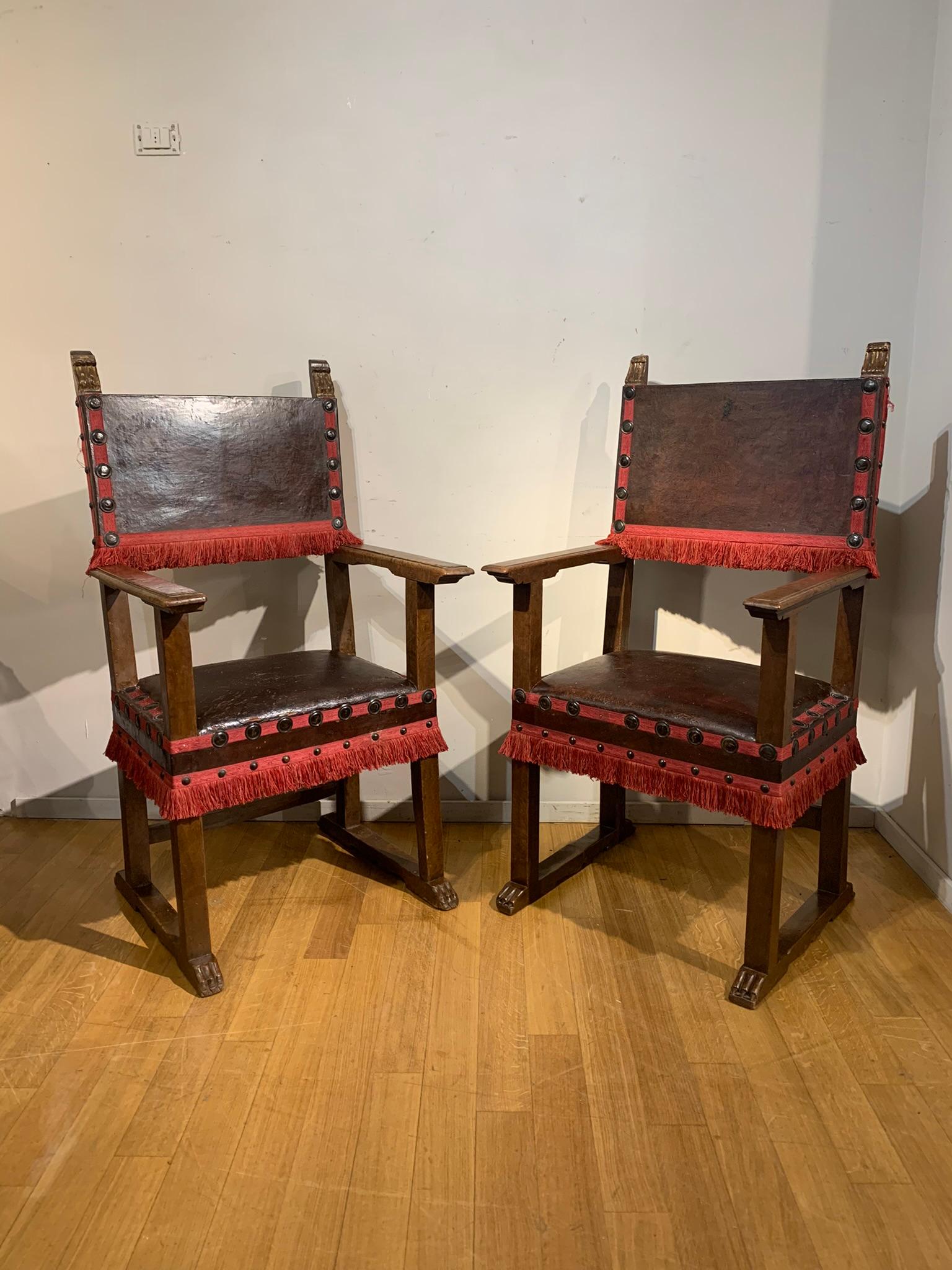 Beautiful pair of thrones for men and women, therefore with slightly different seats, in carved and partially gilded solid walnut.
Typical Florentine manufacture very linear and spartan with straight seats and armrests.
The upholstery is in dark