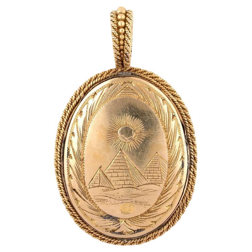 Mounted a pendant in 1st half 19th century by Carlo Giuliano On the back engraved the pyramids in Egypt Size of the cameo is 26mm x 20mm The pendant is long 43mm Carlo Giuliano (1831–1895) was a goldsmith and jeweller operating in London from 1860.