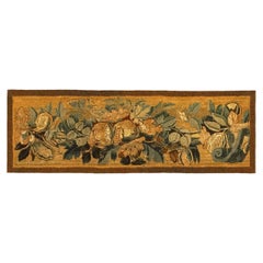 Tapisserie historique flamande de la fin du XVIe siècle, orientée horizontalement, à motifs floraux