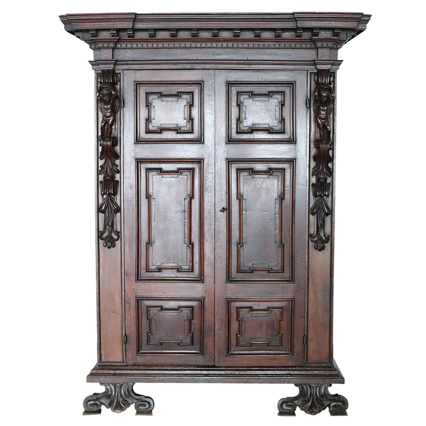 Late 16th Century Italian Louis XIV Hand Carved Walnut Wardrobe or Armoire