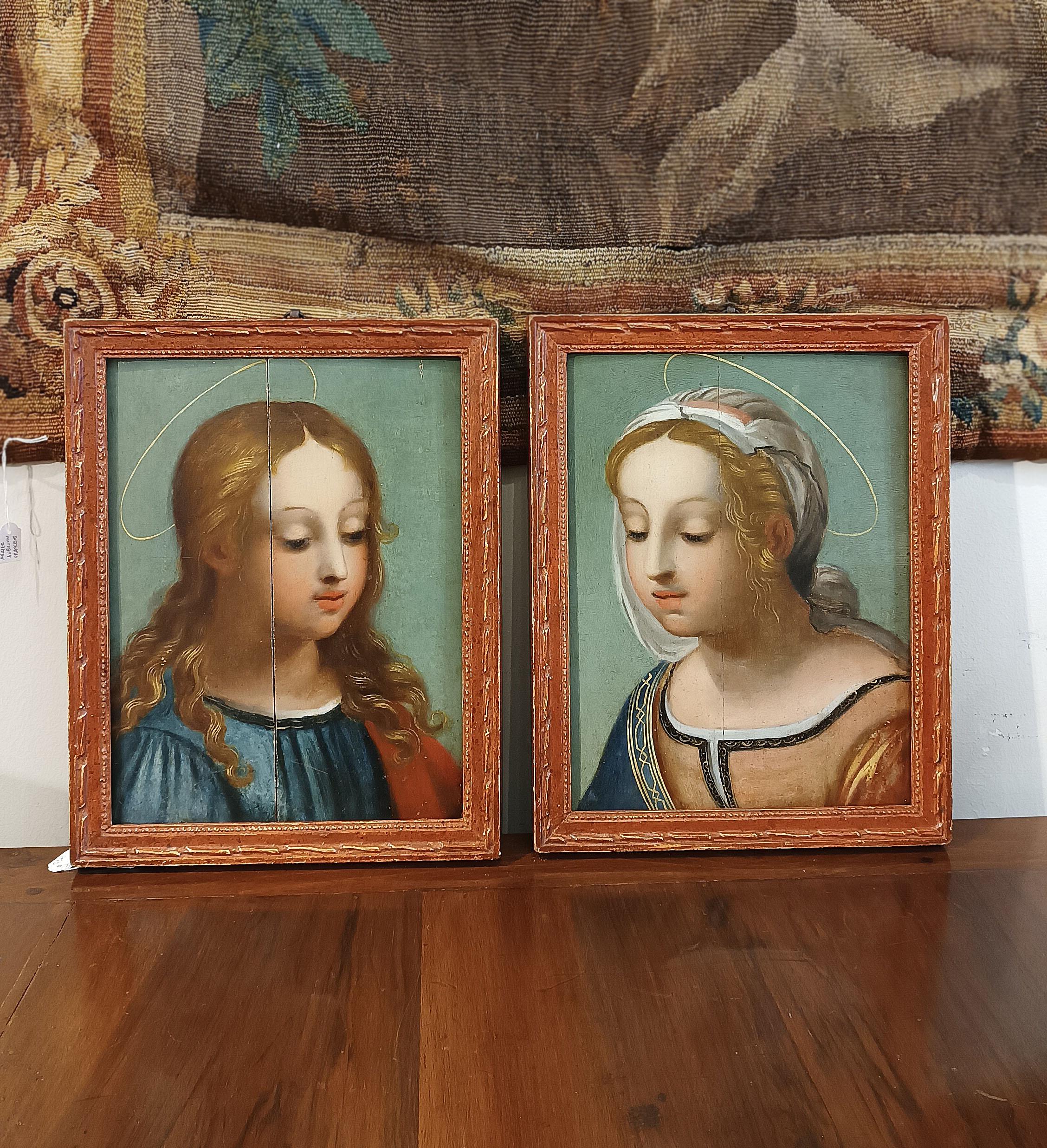 Elegant pair of oil paintings on wooden panels, depicting Jesus and the Madonna in their youthful physiognomy. Originally part of a larger wooden altarpiece, these two works are now presented as precious fragments. Both Jesus and the Madonna are
