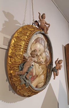 LATE 16th CENTURY POLYCHROME STUCCO WITH MADONNA AND CHILD