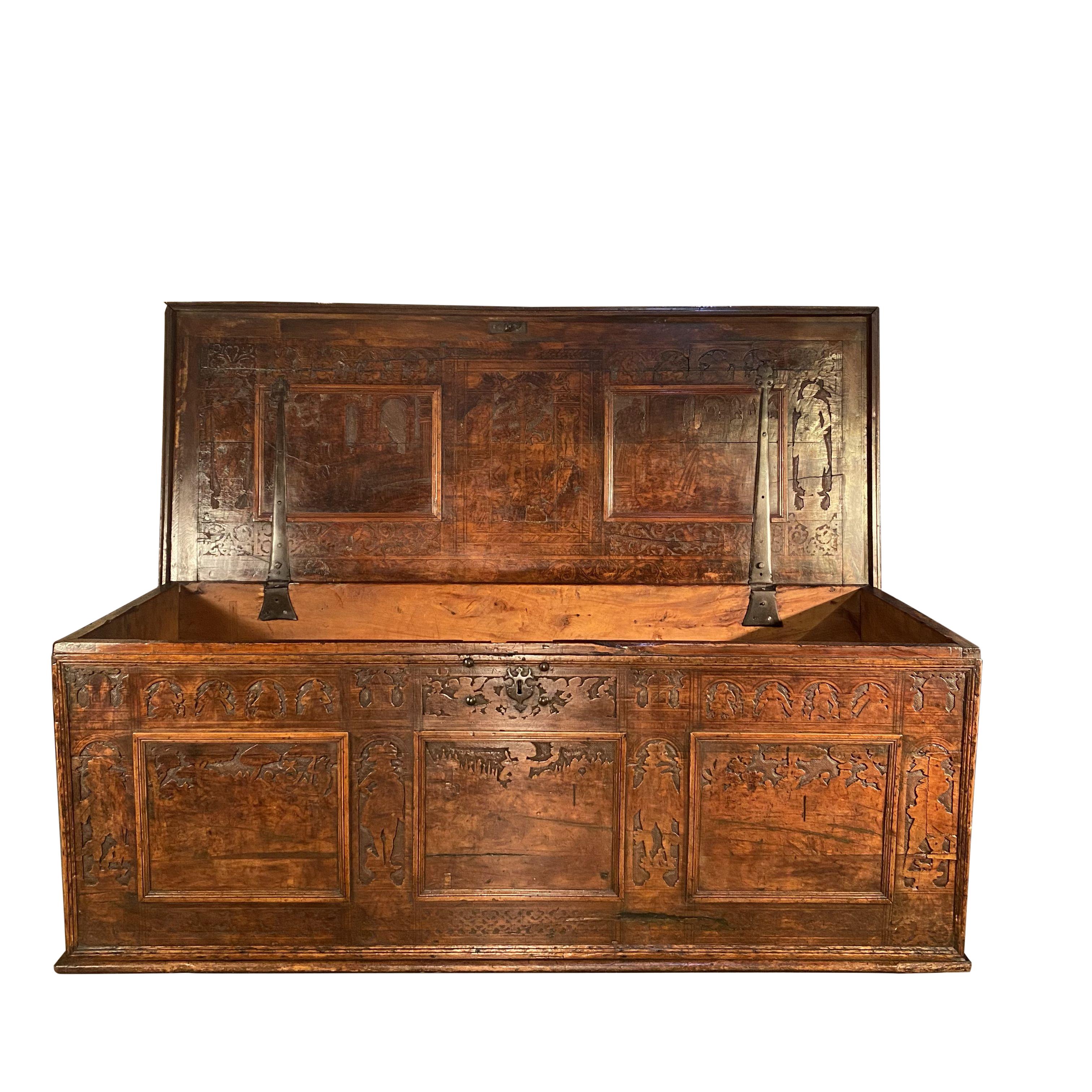 Late 16th century Venetian cedar wood cassone wedding chest featuring finely detailed carving in the champleve decorative style on both the front face and lid interior. 

Measures: 77
