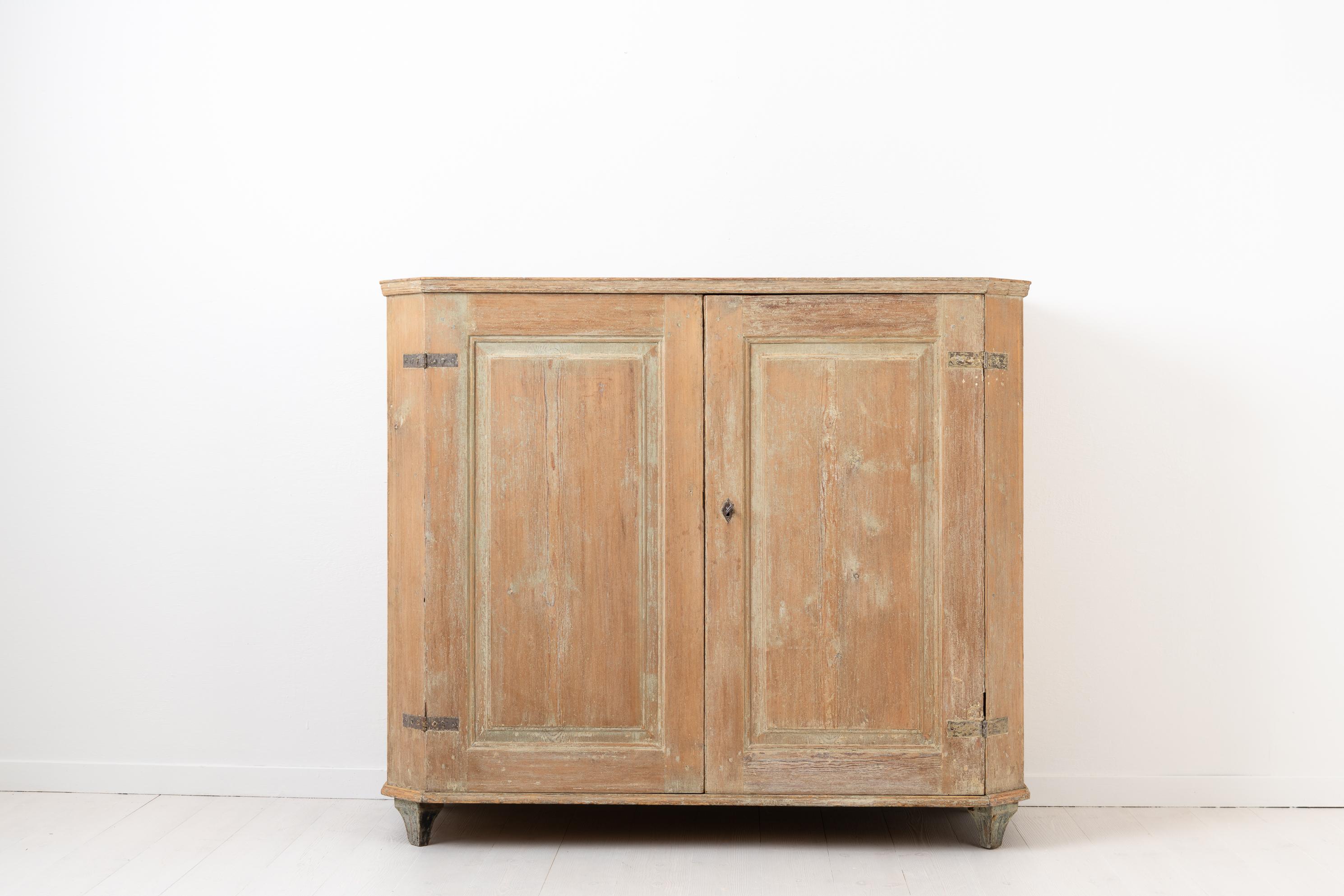 Swedish sideboard from the Gustavian and neoclassical period. The sideboard is made between 1790 and 1810 and has traces of the original paint. The interior is untouched and has a row of drawers with original paint and shelves which are and always