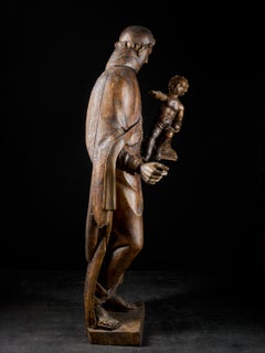 Late 17th Century Italian School Wooden Sculpture of Saint Anthony and the Child