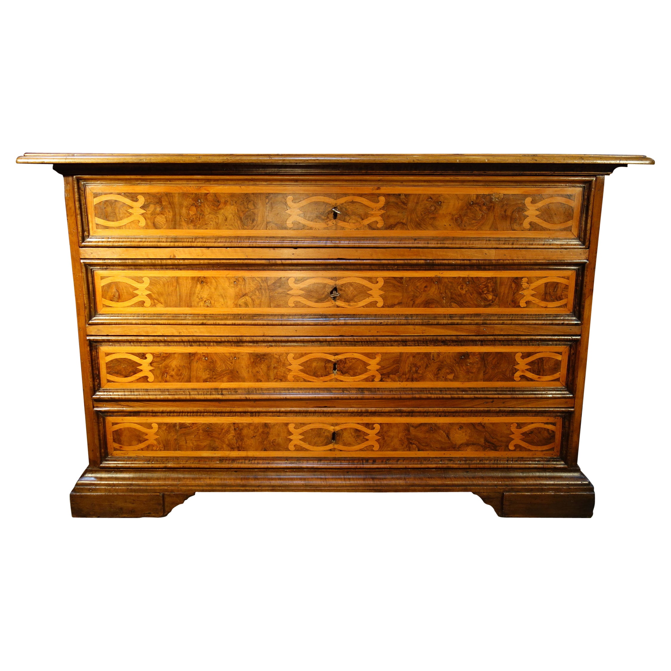 Late 17th Century Louis XIV Italian walnut secretary cabinet, termed a Scrittorio con Scarabattolo, with thick burled walnut drawer fronts and striking carved fruitwood inlay. Fine Renaissance shellac finish in beautiful condition.  
An Italian
