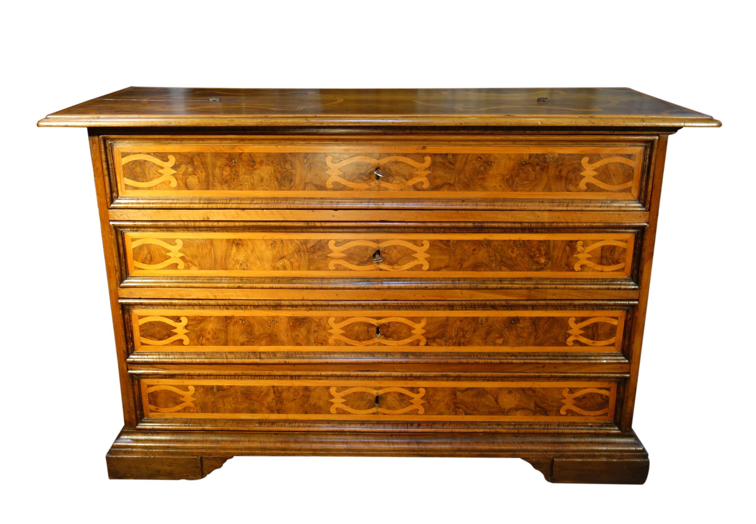 Late 17th Century Louis XIV Italian walnut secretary cabinet, termed a Scrittorio con Scarabattolo, with thick burled walnut drawer fronts and striking carved fruitwood inlay. Fine Renaissance shellac finish in beautiful condition.  
An Italian