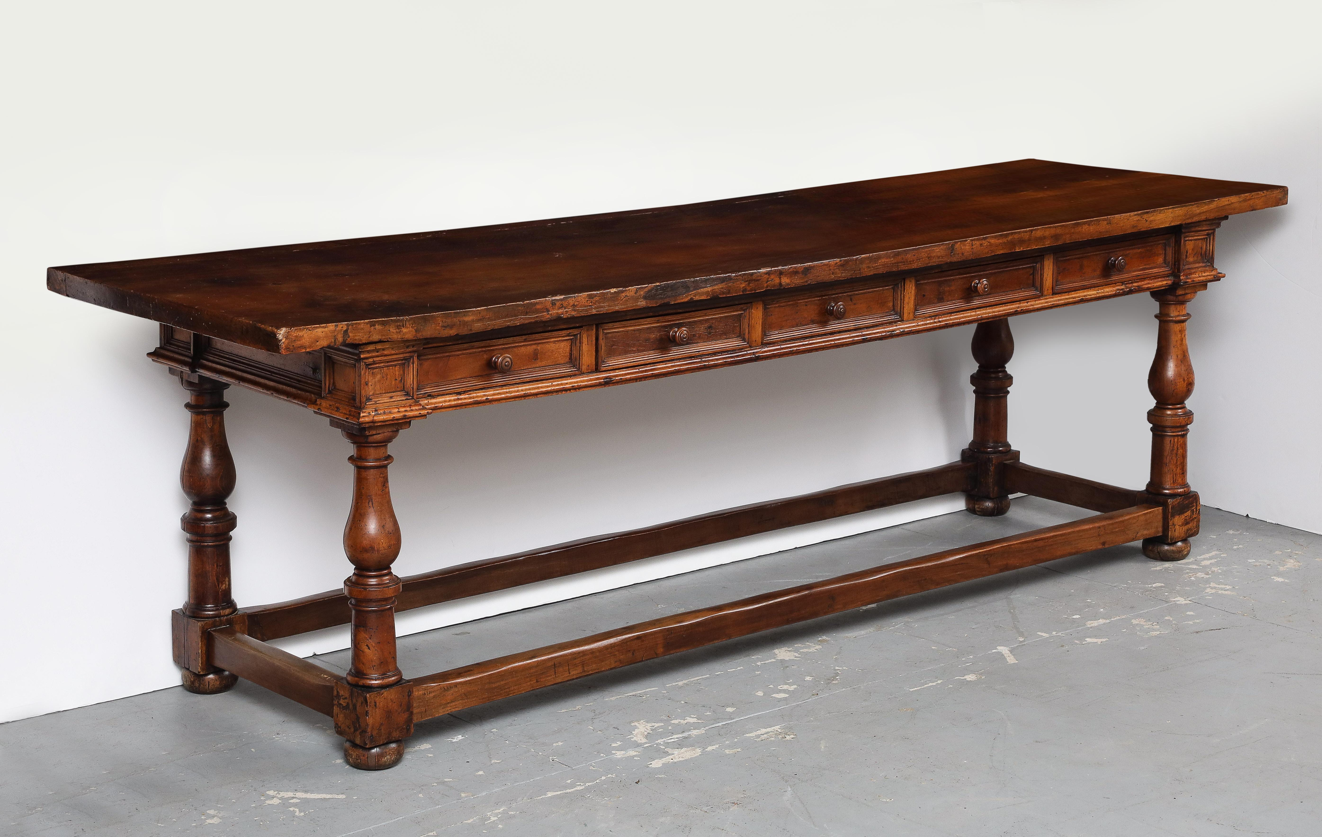 Late 17th C. Tuscan Walnut 5 - Drawer Console Table, Italy	

H: 32.25 D: 28.75 L: 105.5 in.

(This table, the cabinet, and the Demi lunes are from the same house and have always been in the same family since they 												were made in the late