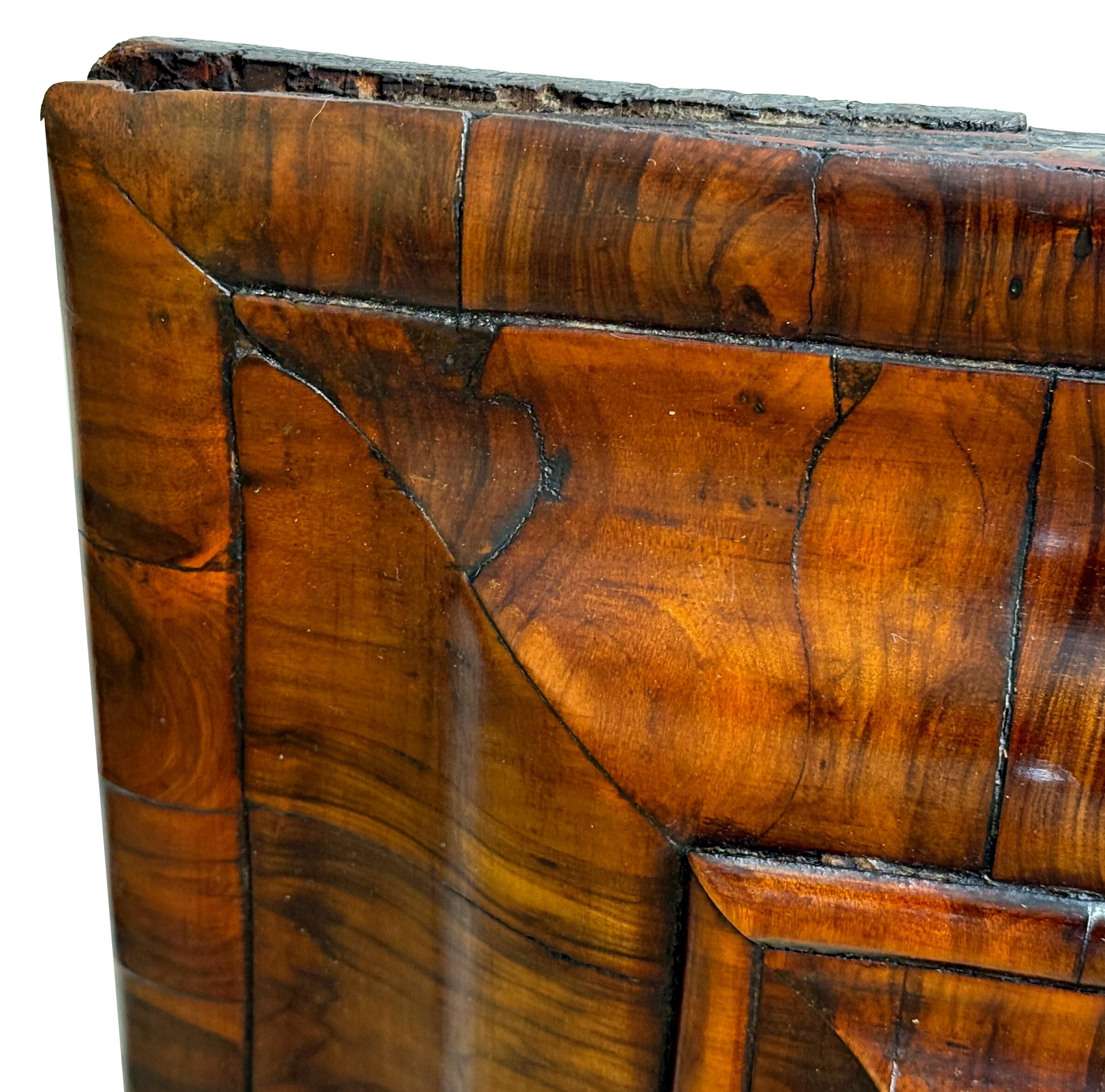 A Relatively Large And Extremely Attractive Late 17th Century, William And Mary Period, Laburnum Oyster Veneered, Cushion Framed, Wall Mirror Retaining Excellent Rich Colour And Patina To Rectangular Frame Enclosing Original Bevelled Mirror