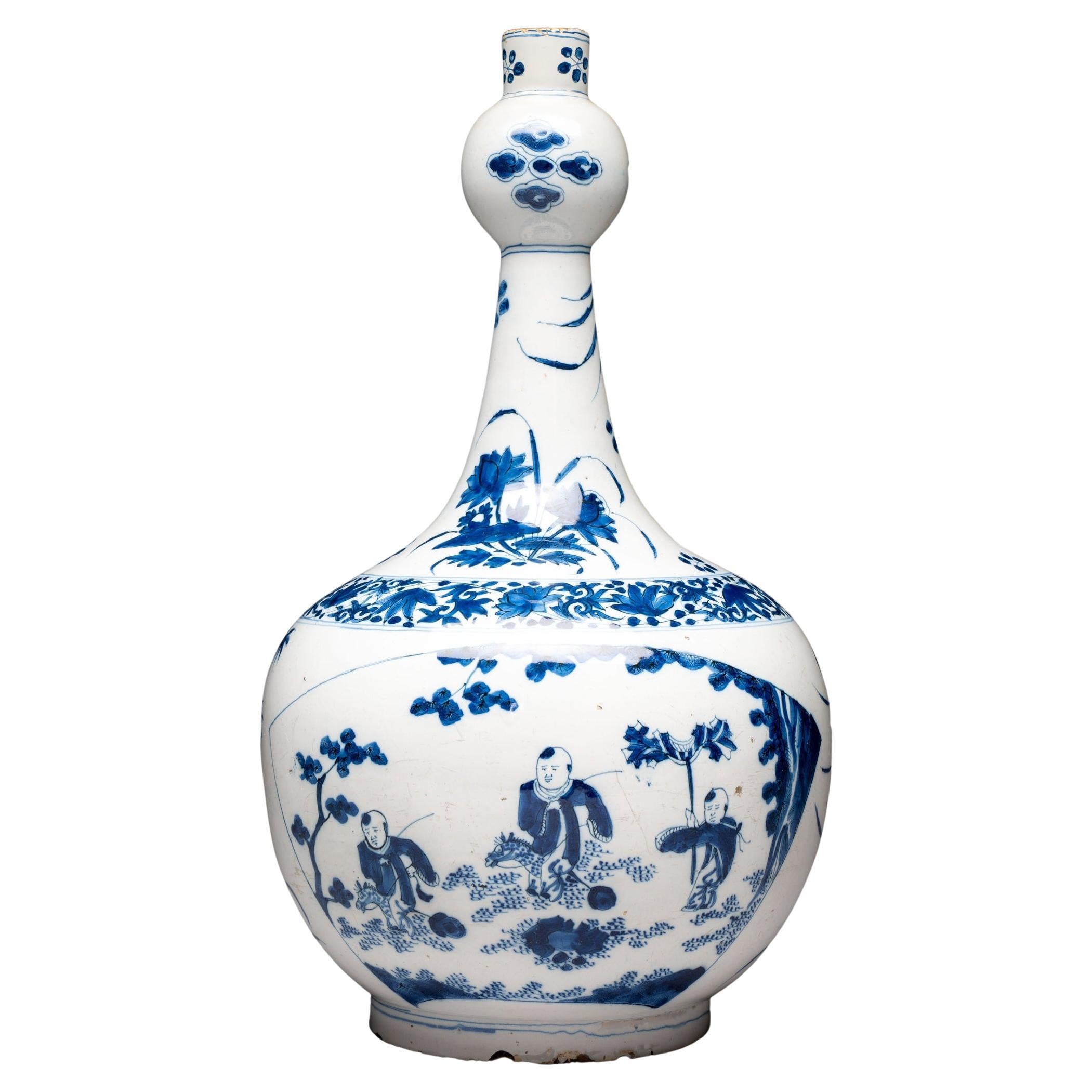Late 17th century, Dutch Delft, Transitional Style Bottle Vase With Playing Boys For Sale