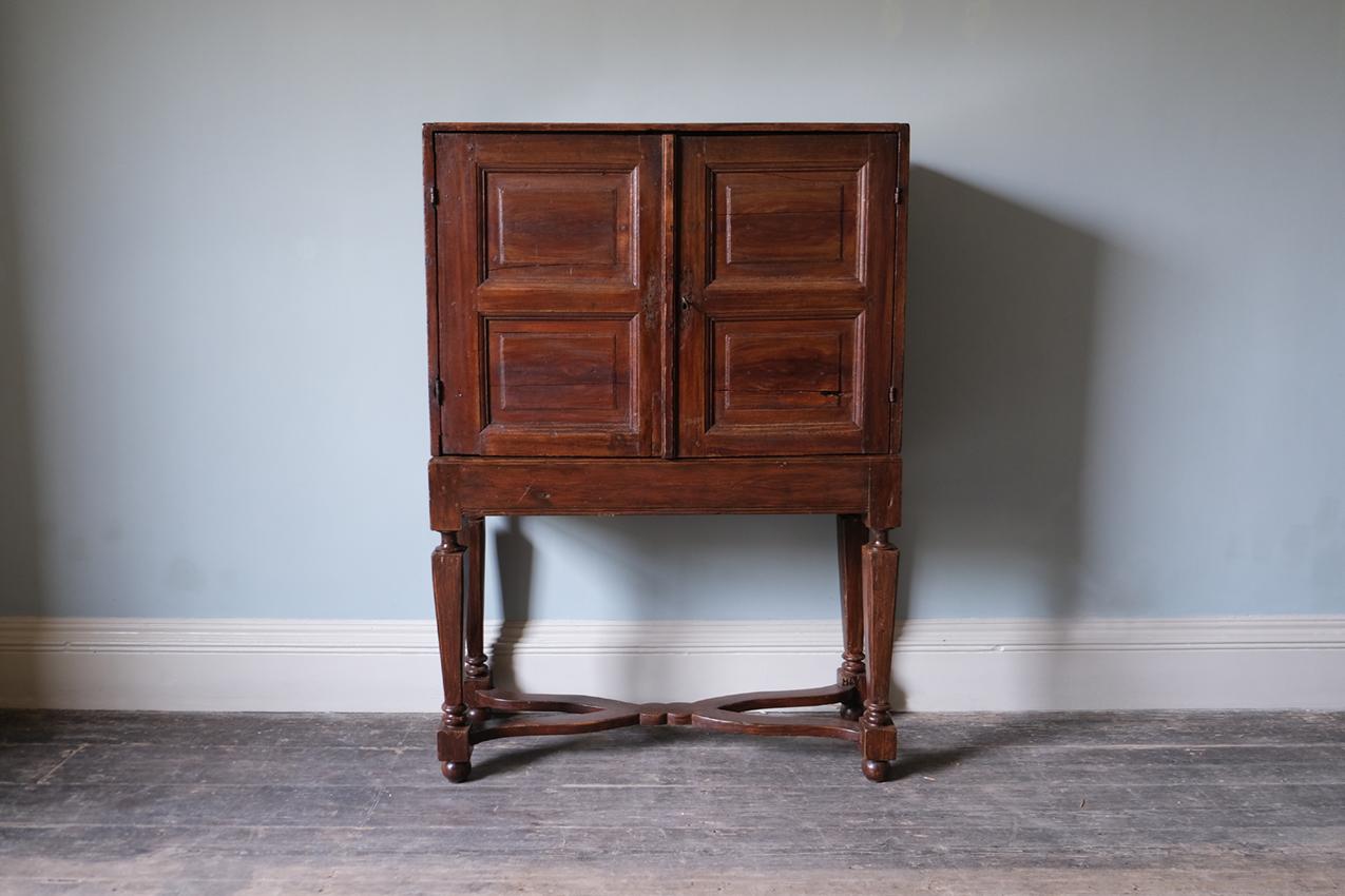 Dutch oak cabinet on stand

An exceptional late 17th-century Dutch oak cabinet-on-stand with an ornately carved interior, depicted in the Baroque manner. The cabinet is adorned with intricate carvings throughout and is raised on a later base. The