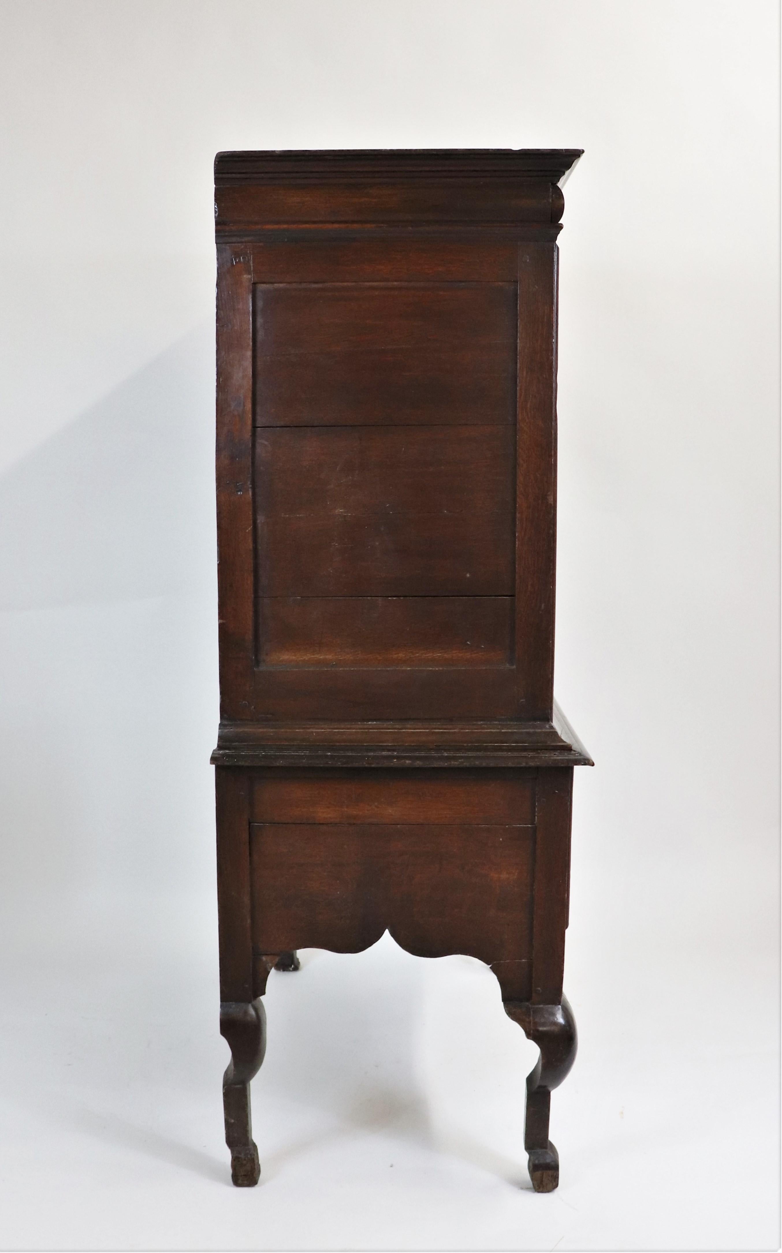 The Charles II period design incorporated a French influence. Furniture was often characterized by elegant carvings with a focus on reliability and usefulness. This dresser has been carved entirely from oak. Oak is a desirable hardwood that is dense