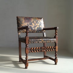Late 17th Century Flemish Walnut Armchair with later Gilt Cordoba Leather